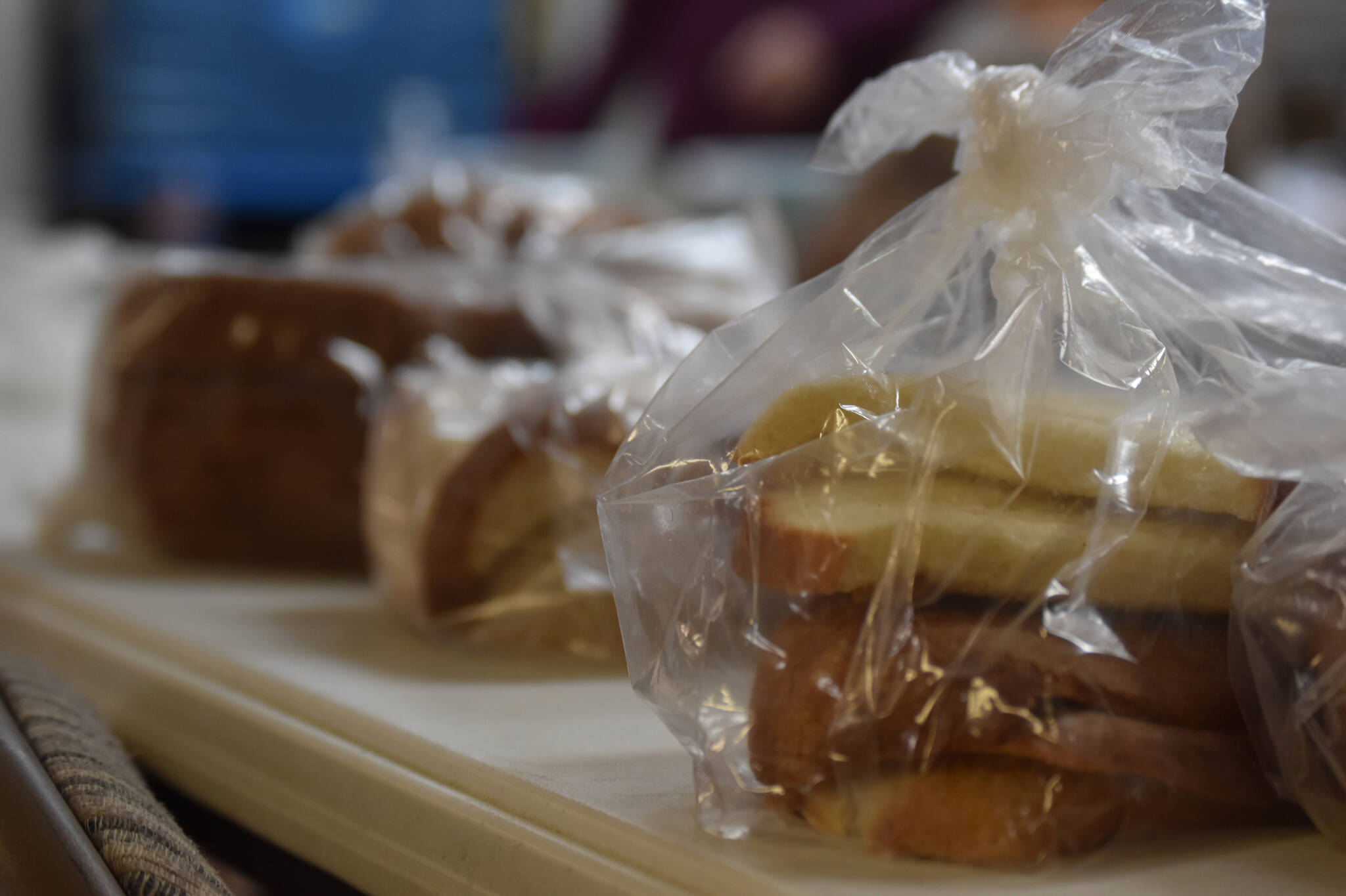 Loaves of bread are available to those in need at Kenai United Methodist Food Pantry in Kenai, Alaska, on Monday, Jan. 23, 2022. (Jake Dye/Peninsula Clarion)