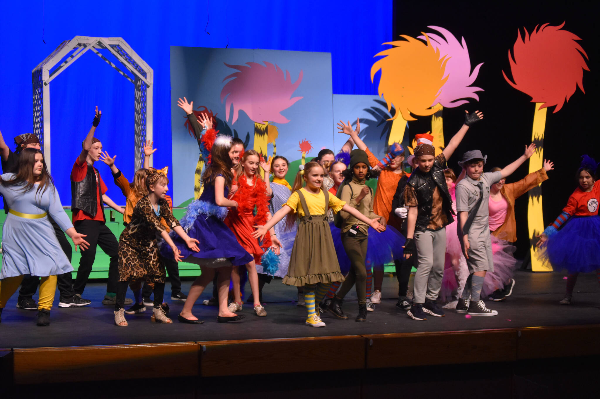 The cast of Triumvirate Theatre’s production of “Seussical” rehearse on Wednesday, Feb. 8, 2023, in the Renee C. Henderson Auditorium at Kenai Central High School in Kenai, Alaska. (Jake Dye/Peninsula Clarion)