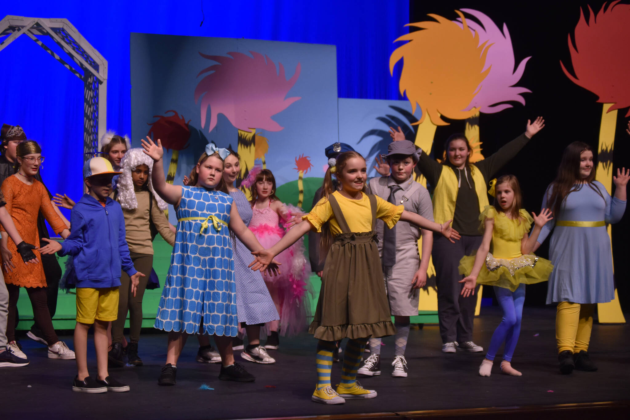 Morgan Hooper, as Jojo, and the cast of Triumvirate Theatre’s production of “Seussical” rehearse on Wednesday, Feb. 8, 2023, in the Renee C. Henderson Auditorium at Kenai Central High School in Kenai, Alaska. (Jake Dye/Peninsula Clarion)