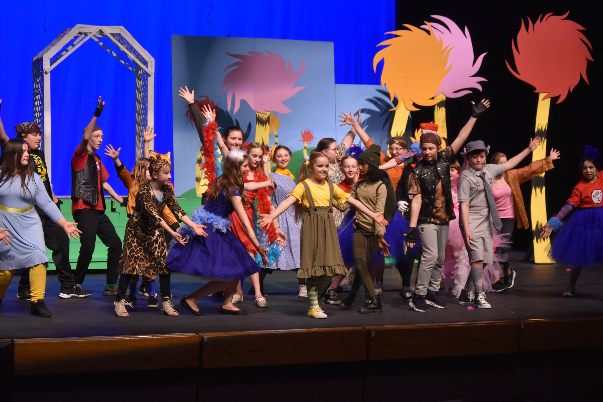 The cast of Triumvirate Theatre’s production of “Seussical” rehearse on Wednesday, Feb. 8, 2023, in the Renee C. Henderson Auditorium at Kenai Central High School in Kenai, Alaska. (Jake Dye/Peninsula Clarion)