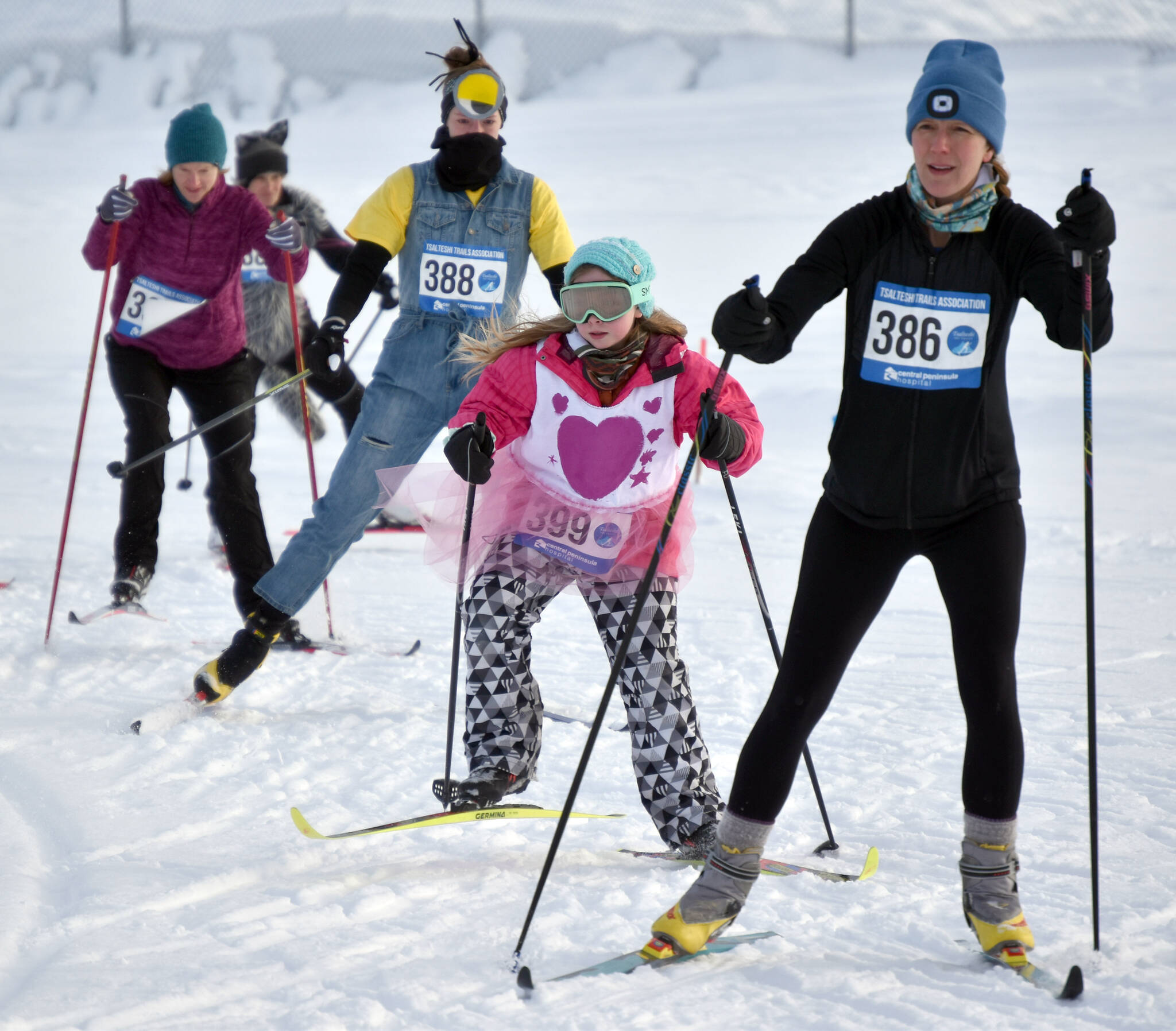 Photos by Jeff Helminiak/Peninsula Clarion 
Elise Spofford, Alice Marang and Emma Blake lead a pack at the 19th annual Ski For Women on Sunday at Tsalteshi Trails just outside of Soldotna.