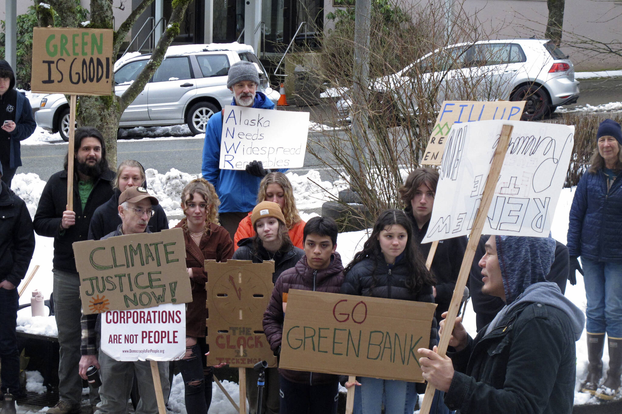 AP Photo/Becky Bohrer 
People rally in support of renewable energy policies, such as strengthening a renewable energy fund, across from the Alaska Capitol on Friday, Feb. 3, 2023, in Juneau, Alaska. Some environmentalists are skeptical of legislation proposed by Gov. Mike Dunleavy that aims to capitalize on carbon storage and carbon markets.