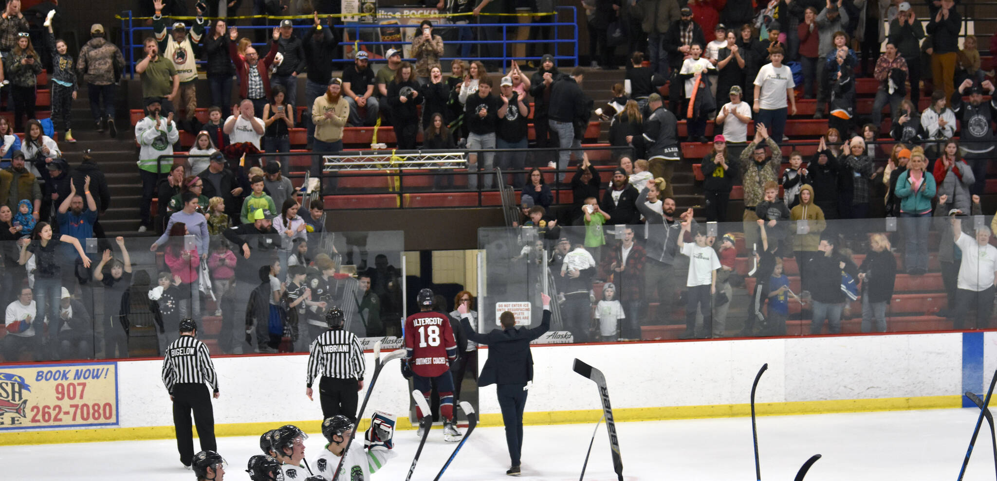 Kenai River head coach Taylor Shaw thanks the crowd after the Brown Bears defeated the Fairbanks Ice Dogs in overtime Saturday, Feb. 18, 2023, at the Soldotna Regional Sports Complex in Soldotna, Alaska. (Photo by Jeff Helminiak/Peninsula Clarion)