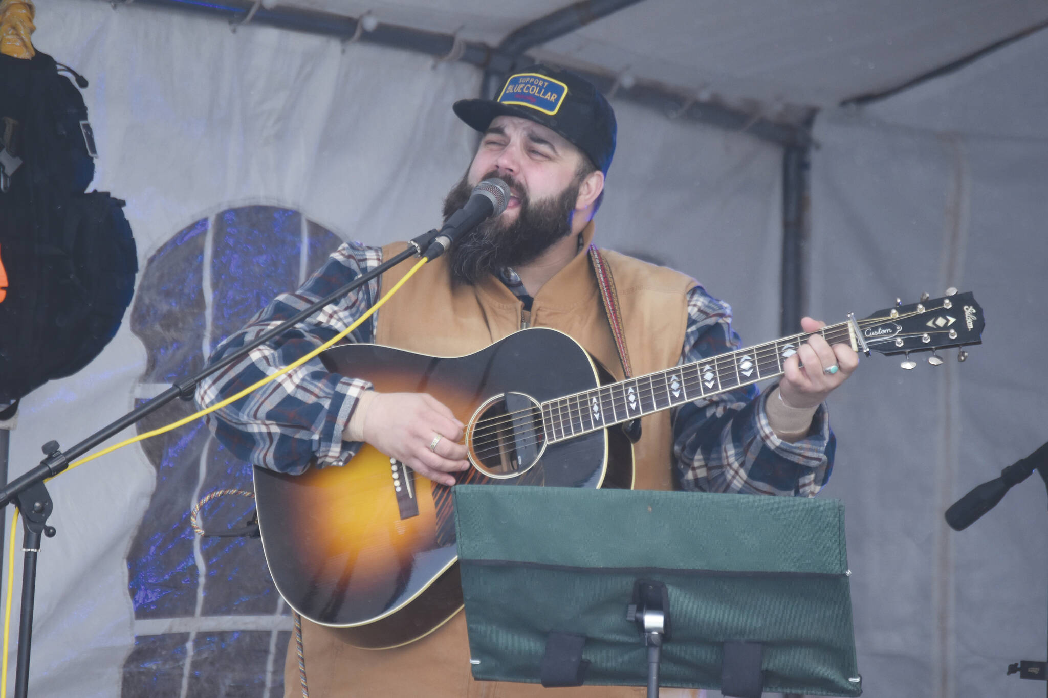 Jake Dye/Peninsula Clarion 
The Ridgeway Rounders perform during Frozen RiverFest on Saturday at Soldotna Creek Park in Soldotna.