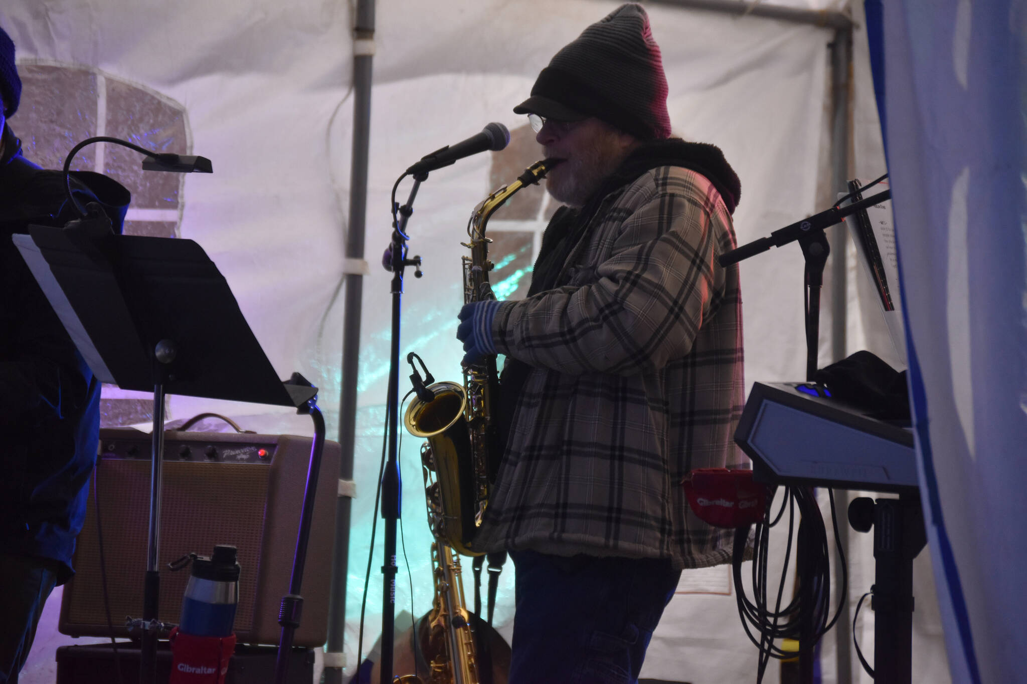 The Derek Poppin Band perform during Frozen RiverFest on Saturday, Feb. 18, 2023, at Soldotna Creek Park in Soldotna, Alaska. (Jake Dye/Peninsula Clarion)