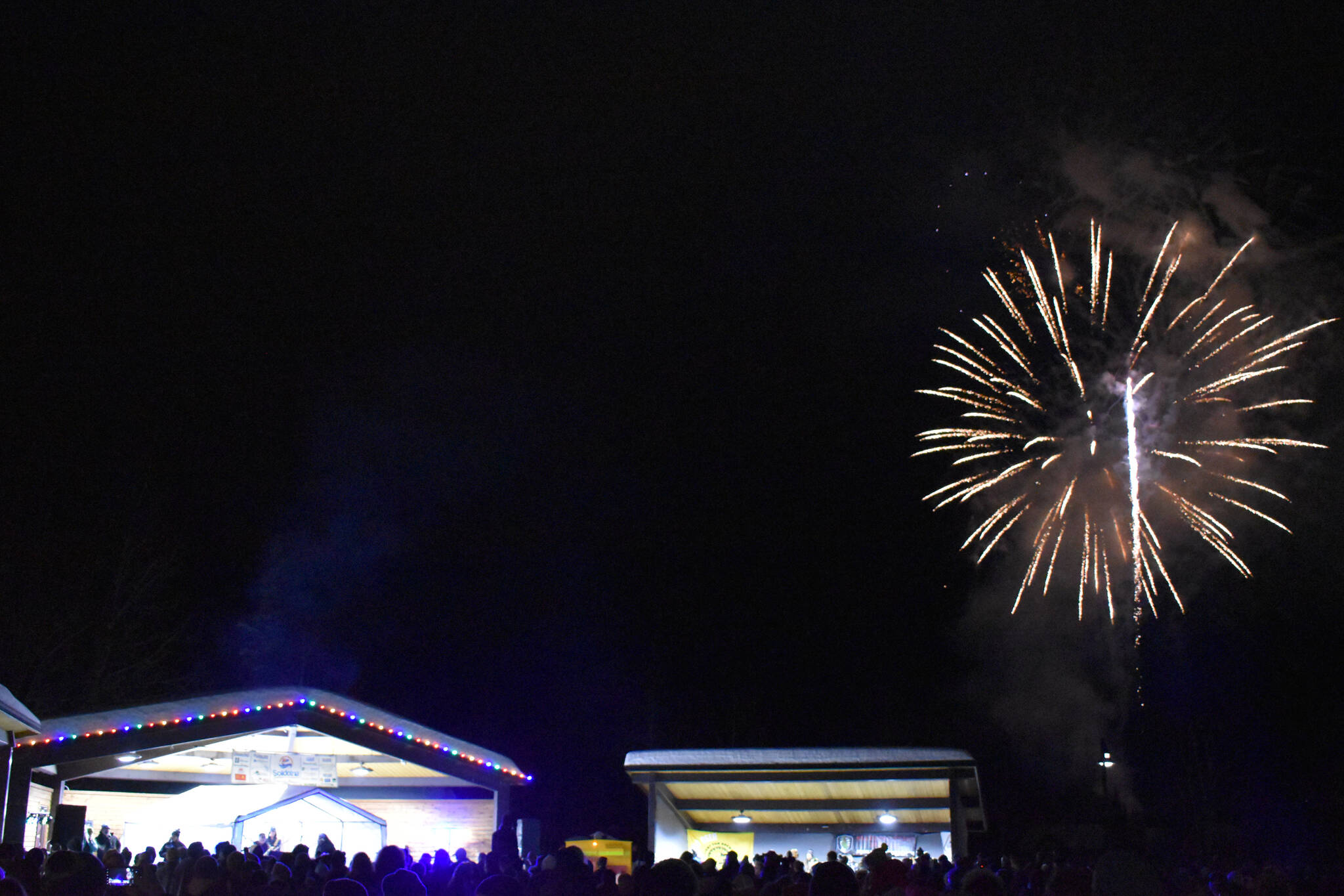 Fireworks explode over a audience of hundreds as the Derek Poppin Band performs onstage during Frozen RiverFest on Saturday, Feb. 18, 2023 at Soldotna Creek Park in Soldotna, Alaska. (Jake Dye/Peninsula Clarion)
Fireworks explode over a audience of hundreds as the Derek Poppin Band performs onstage during Frozen RiverFest on Saturday, Feb. 18, 2023 at Soldotna Creek Park in Soldotna, Alaska. (Jake Dye/Peninsula Clarion)