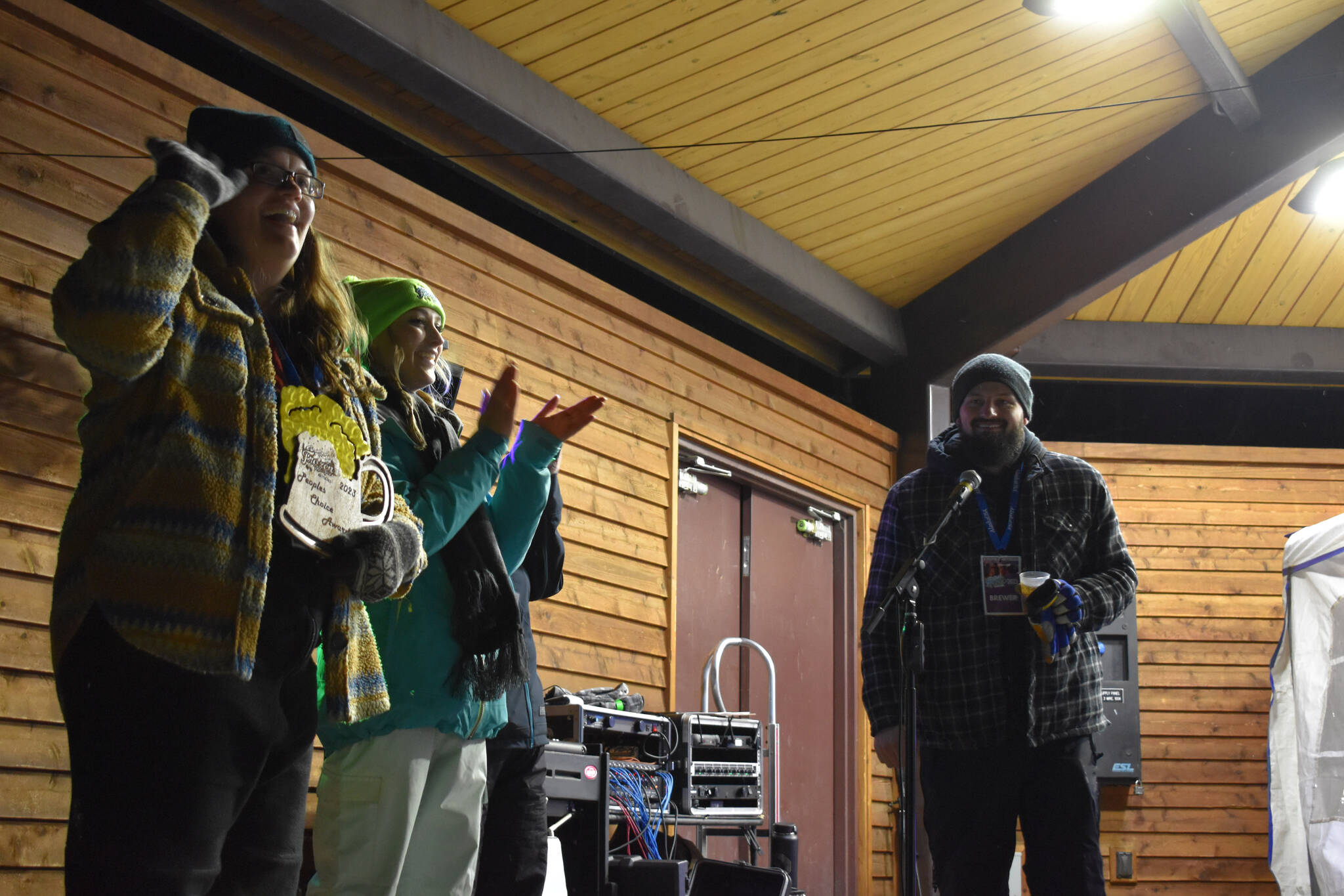 Naptowne Brewing Company is awarded the 2023 People’s Choice Award during Frozen RiverFest on Saturday, Feb. 18, 2023 at Soldotna Creek Park in Soldotna, Alaska. (Jake Dye/Peninsula Clarion)