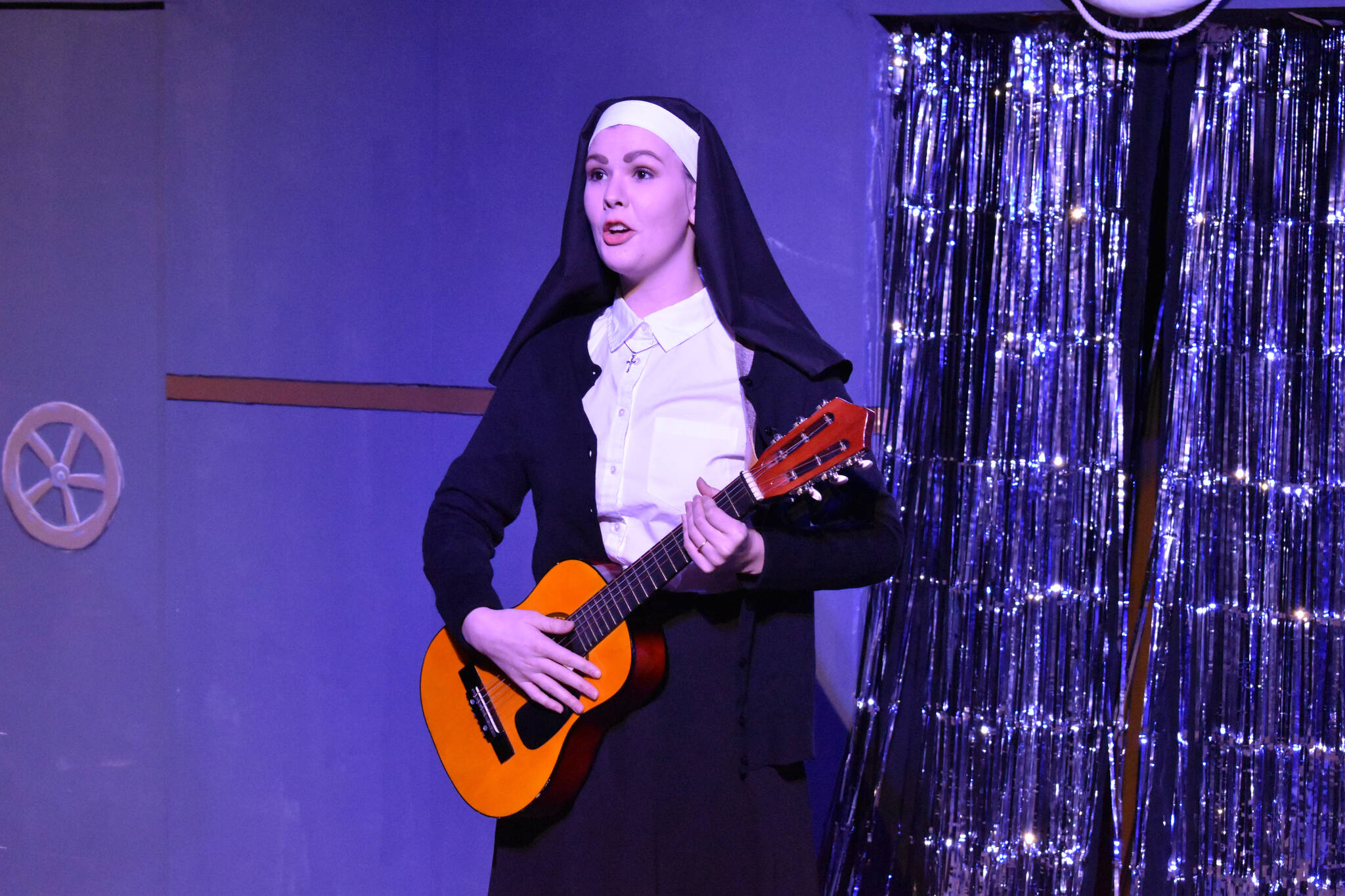 Alyeska Garrett portrays Sister Mary during a rehersal of “Disaster!” on Tuesday, Feb. 21, 2023, at the Kenai Performers’ Theater in Soldotna, Alaska. (Jake Dye/Peninsula Clarion)