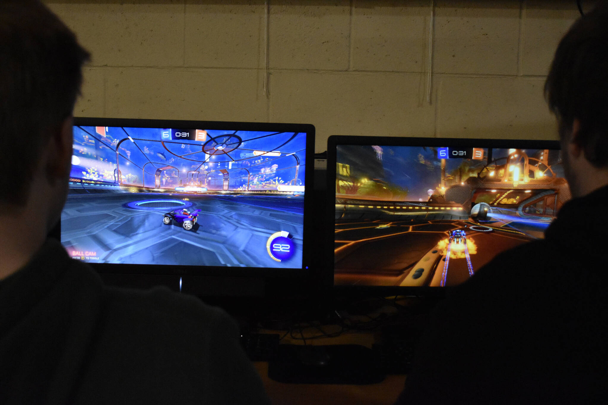 Soldotna High School esports players Graehm LeFevre and Bryce LeFevre participate in a Rocket League practice match on Thursday, Feb. 23, 2023, at Skyview Middle School in Soldotna, Alaska. (Jake Dye/Peninsula Clarion)