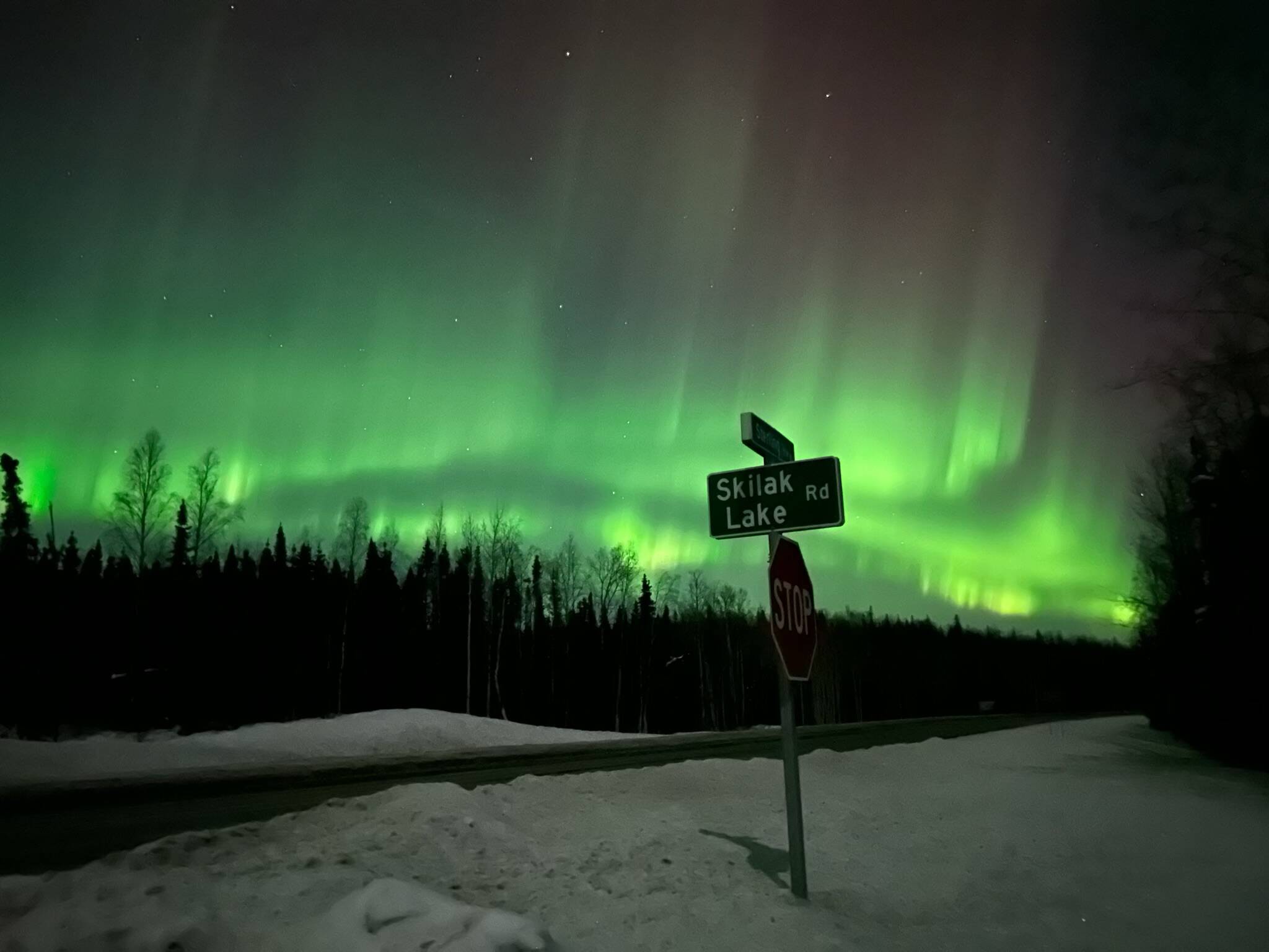 The aurora borealis light up the sky over Skilak Lake Road in Soldotna, Alaska, on Sunday, Feb. 26, 2023. (Photo courtesy April Walgenbach)