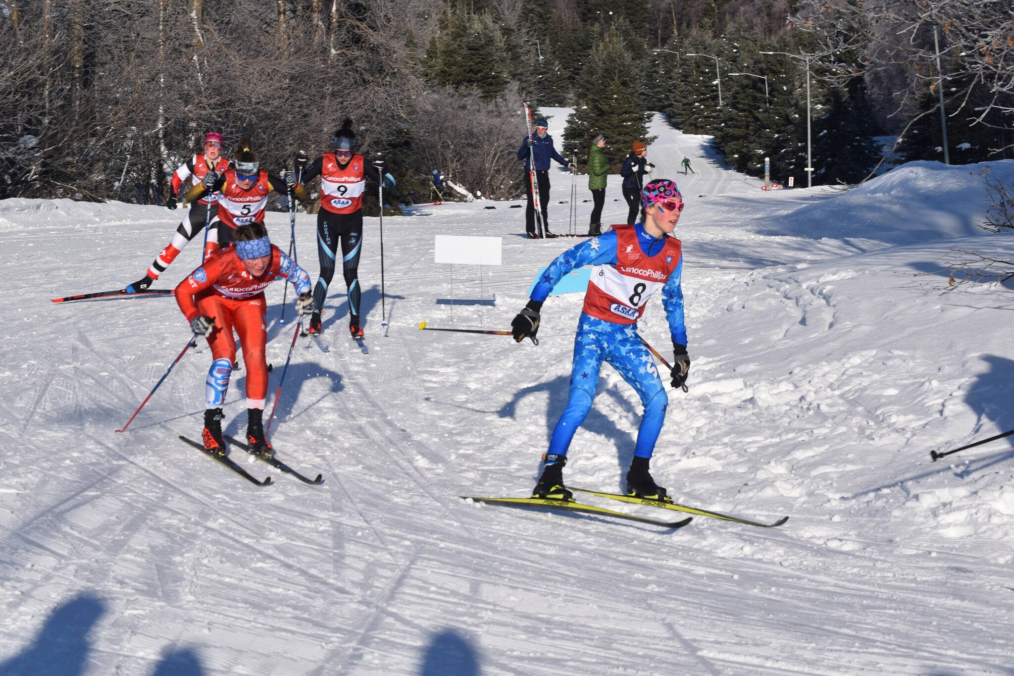 Soldotna’s Tania Boonstra leads a pack of girls from East, Chugiak, Kenai and South during the first leg of the girls 4x3.5-kilometer relay at the ASAA State Nordic Ski Championships at Kincaid Park in Anchorage, Alaska, on Saturday, Feb. 25, 2023. (Jake Dye/Peninsula Clarion)