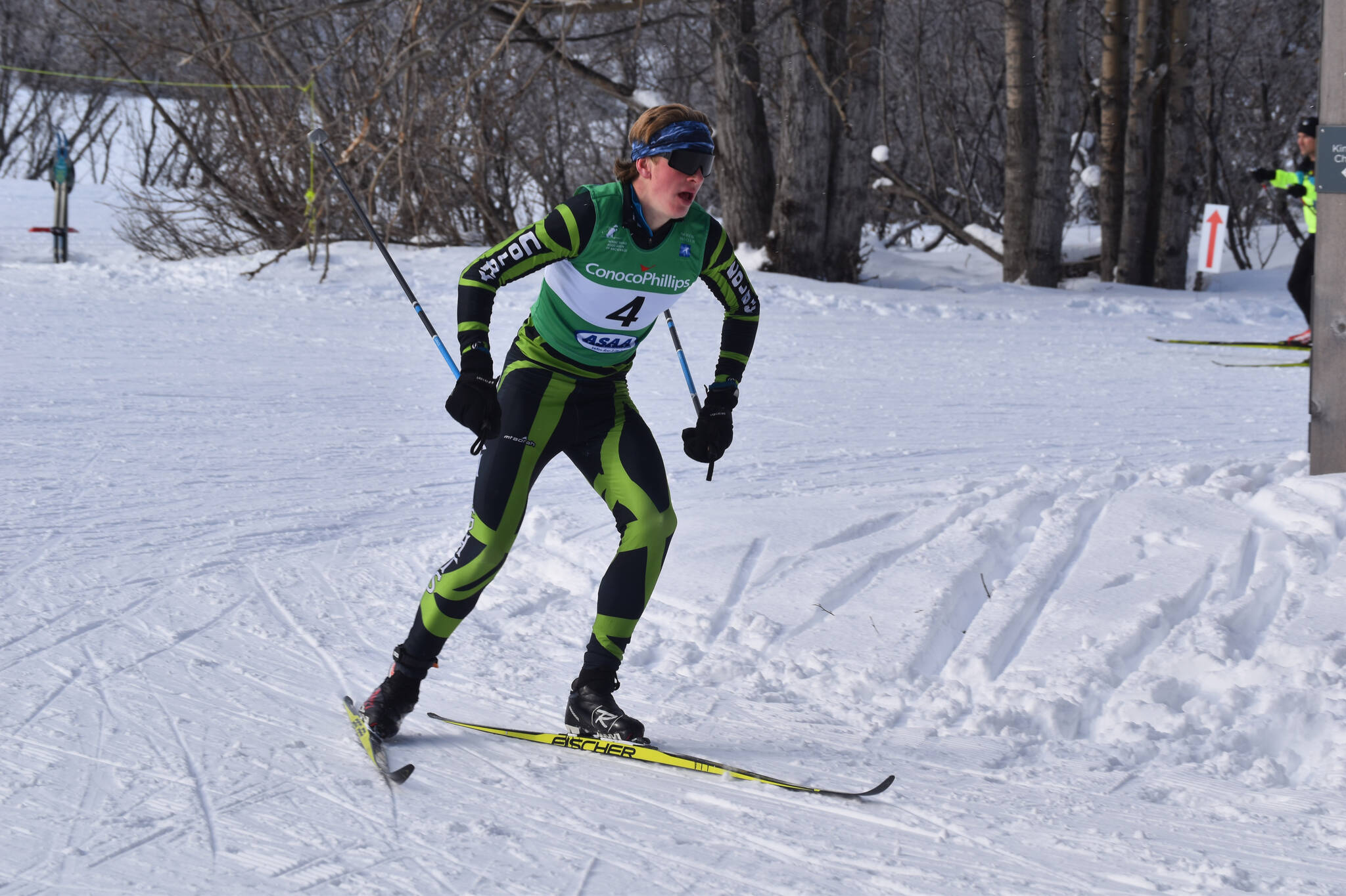 Colony’s Coby Marvin pushes through the second leg of the boys 4x5-kilometer relay at the ASAA State Nordic Ski Championships at Kincaid Park in Anchorage, Alaska, on Saturday, Feb. 25, 2023. (Jake Dye/Peninsula Clarion)