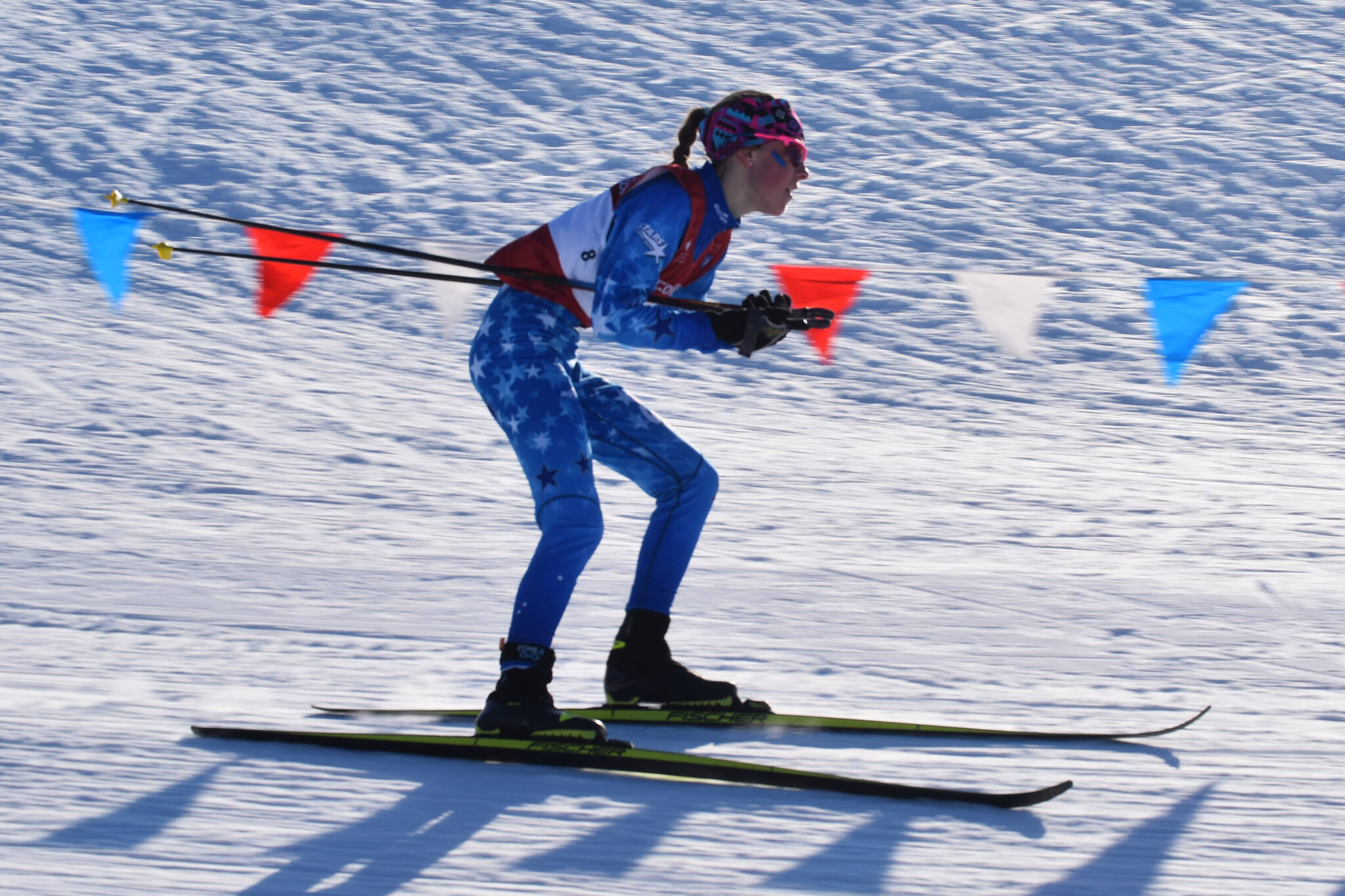 Soldotna’s Tania Boonstra rounds a bend during the first leg of the girls 4x3.5-kilometer relay at the ASAA State Nordic Ski Championships at Kincaid Park in Anchorage, Alaska, on Saturday, Feb. 25, 2023. (Jake Dye/Peninsula Clarion)