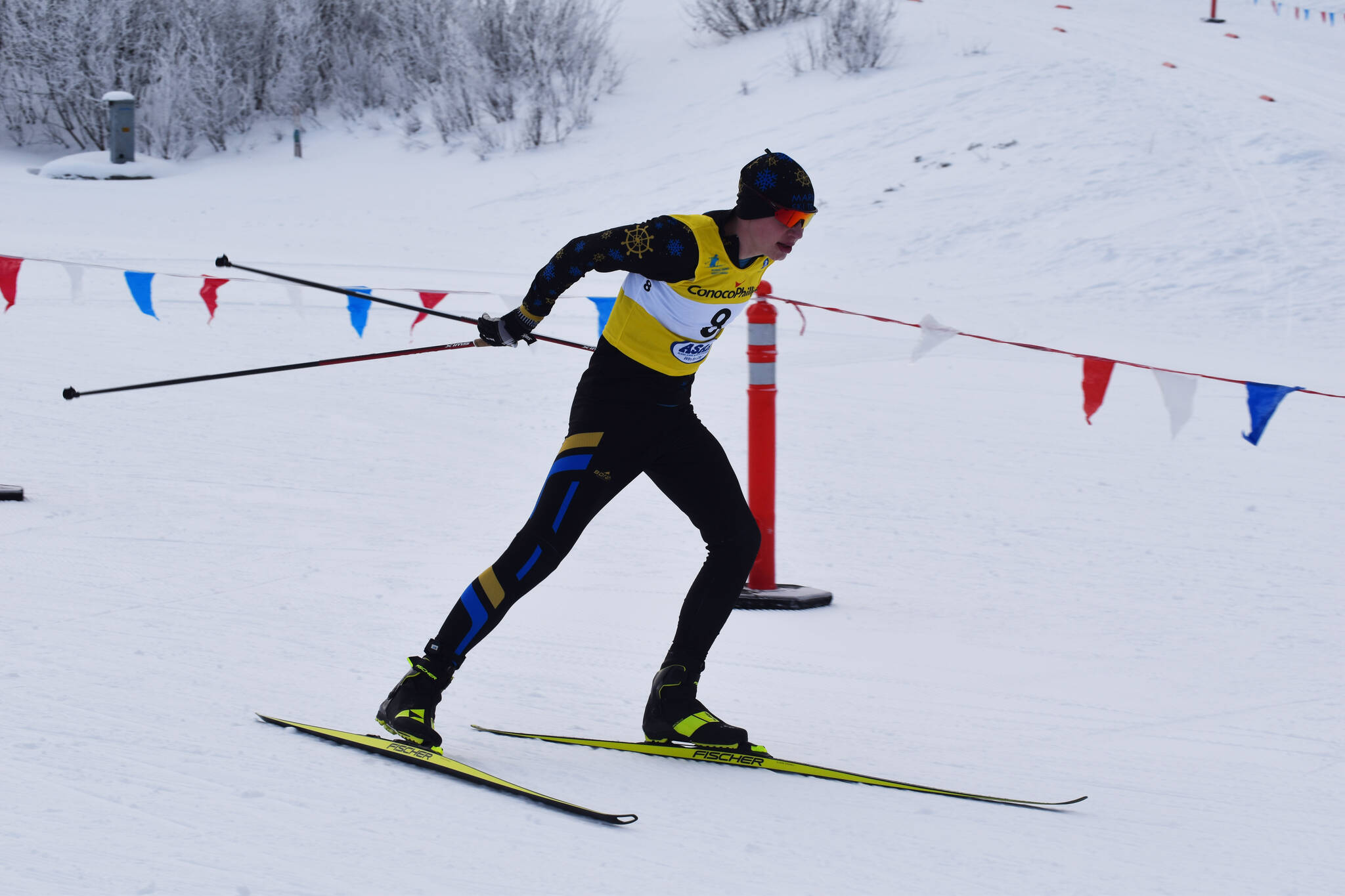 Ethan Styvar pushes through the third leg of the boys 4x5-kilometer relay at the ASAA State Nordic Ski Championships at Kincaid Park in Anchorage, Alaska, on Saturday, Feb. 25, 2023. (Jake Dye/Peninsula Clarion)