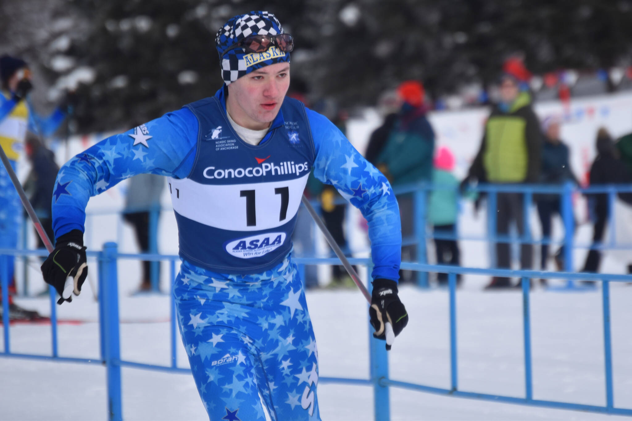 Jonathan Gordon, of Soldotna, takes off on the final leg of the boys 4x5-kilometer relay at the ASAA State Nordic Ski Championships at Kincaid Park in Anchorage, Alaska, on Saturday, Feb. 25, 2023. (Jake Dye/Peninsula Clarion)