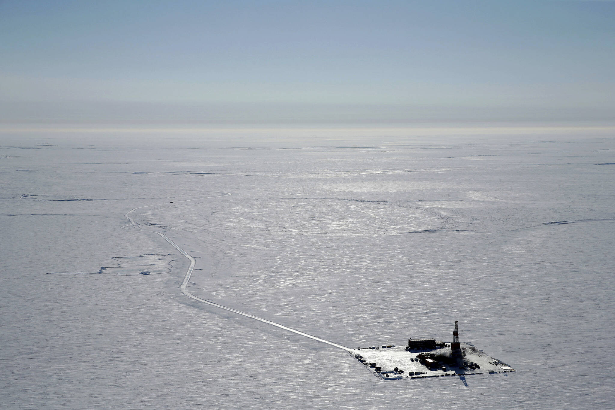This 2019 aerial photo provided by ConocoPhillips shows an exploratory drilling camp at the proposed site of the Willow oil project on Alaska’s North Slope. The Biden administration is weighing approval of a major oil project on Alaska’s petroleum-rich North Slope that supporters say represents an economic lifeline for Indigenous communities in the region but environmentalists say is counter to Biden’s climate goals. A decision on ConocoPhillips Alaska’s Willow project, in a federal oil reserve roughly the size of Indiana, could come by early March 2023. (ConocoPhillips via AP, File)