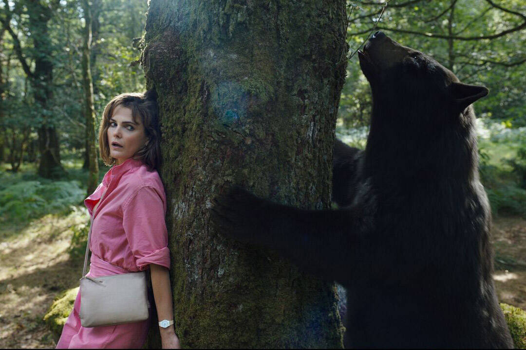 Keri Russell’s Sari hides from the Cocaine Bear in “Cocaine Bear.” (Photo courtesy Universal Pictures)