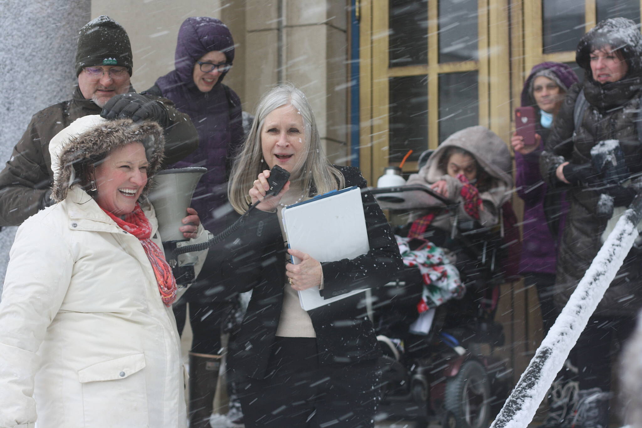 Mark Sabbatini / Juneau Empire
Rep. Andi Story, D-Juneau, advocates for more state funding on behalf of Alaska residents with disabilities so they can “live as independently as possible” with the help of service providers during a rally in a heavy snowstorm at midday Wednesday on the steps of the Alaska State Capitol.