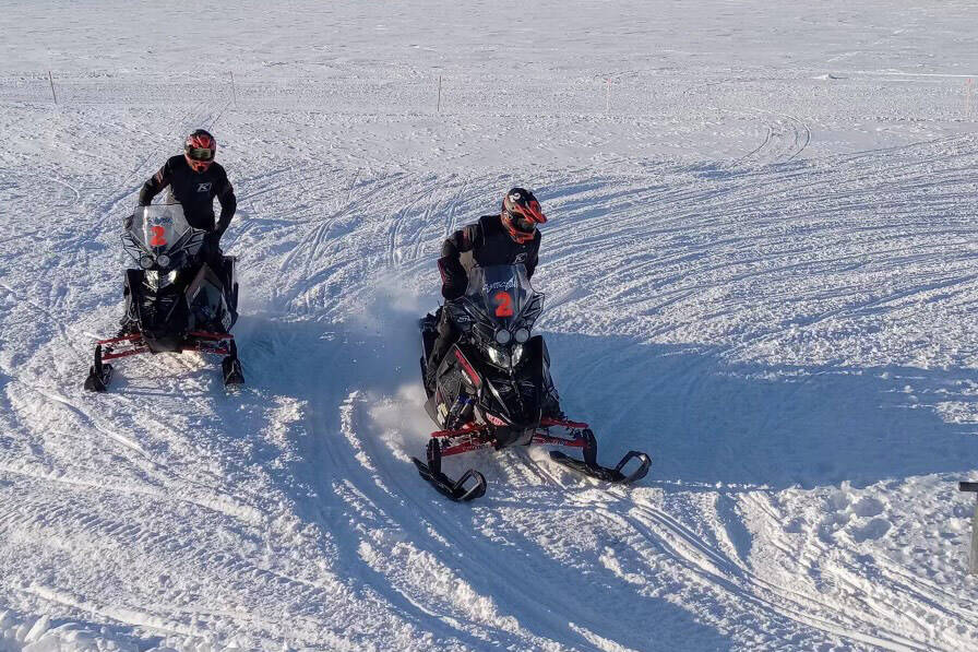 Team #2 — Bradley Kishbaugh, of Soldotna, and Ryan Sottosanti, of Wasilla — ride their snowmachine during the 2023 Iron Dog. (Photo provided by Bradley Kishbaugh)