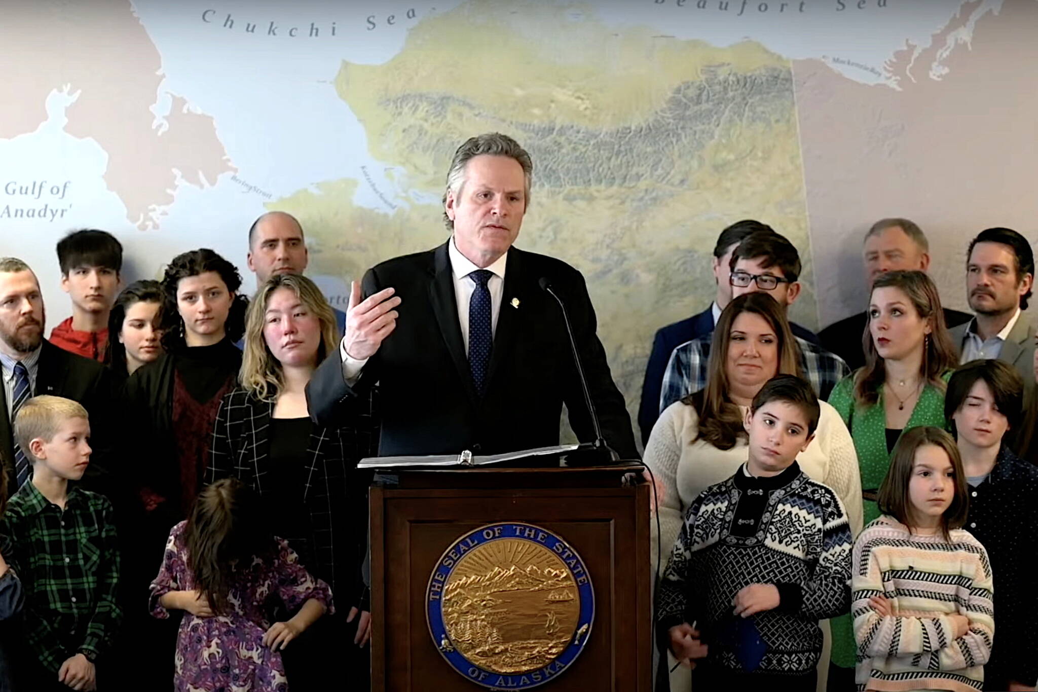 Gov. Mike Dunleavy unveils proposals to offer public school teachers annual retention bonuses and enact policies similar so-called “don’t say gay” laws in states such as Florida during a press conference in Anchorage on Tuesday, March 7, 2023. (Screenshot from official livestream)