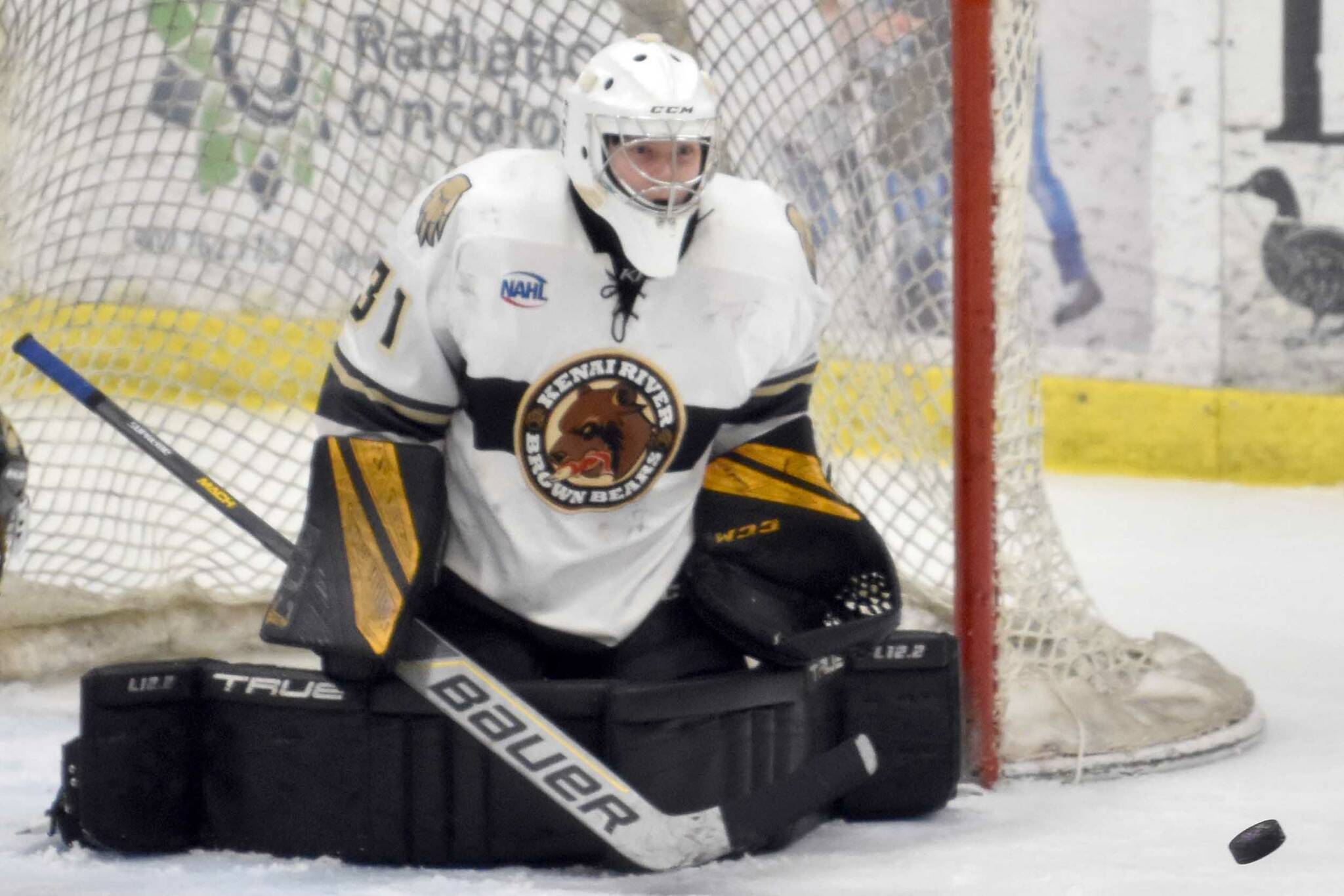 Kenai River goaltender Nils Wallstrom makes a save Saturday, Feb. 25, 2023, against the Janesville (Wisconsin) Jets at the Soldotna Regional Sports Complex in Soldotna, Alaska. (Photo by Jeff Helminiak/Peninsula Clarion)