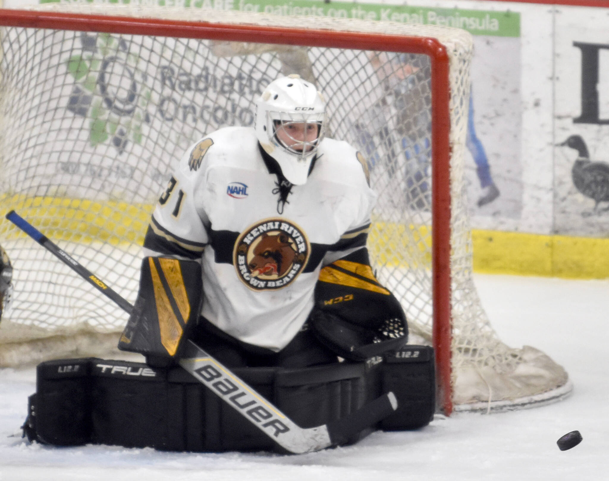 Kenai River goaltender Nils Wallstrom makes a save Saturday, Feb. 25, 2023, against the Janesville (Wisconsin) Jets at the Soldotna Regional Sports Complex in Soldotna, Alaska. (Photo by Jeff Helminiak/Peninsula Clarion)
