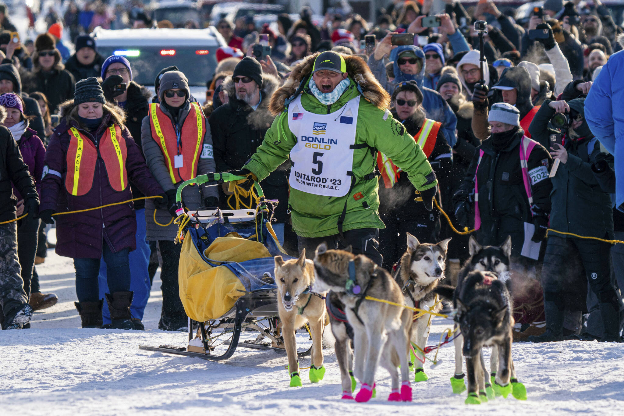 Ryan Redington mushes down Front Street to win the 2023 Iditarod Trail Sled Dog Race Tuesday, March 14, 2023 in Nome, Alaska. Redington, 40, is the grandson of Joe Redington Sr., who helped co-found the arduous race across Alaska that was first held in 1973 and is known as the “Father of the Iditarod.” (Loren Holmes/Anchorage Daily News via AP)