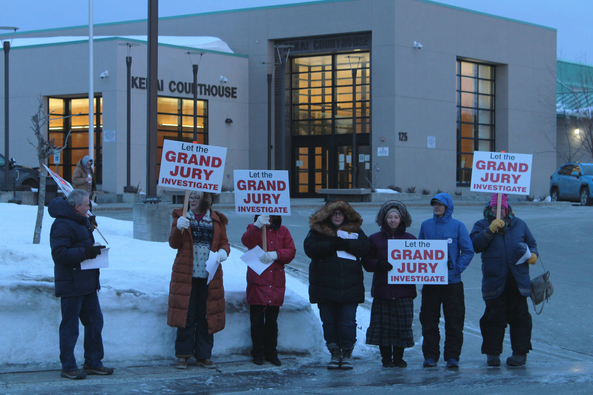 Demonstrators gather outside of the Kenai Courthouse on Wednesday, Feb. 15, 2023, in Kenai, Alaska. (Ashlyn O’Hara/Peninsula Clarion)
