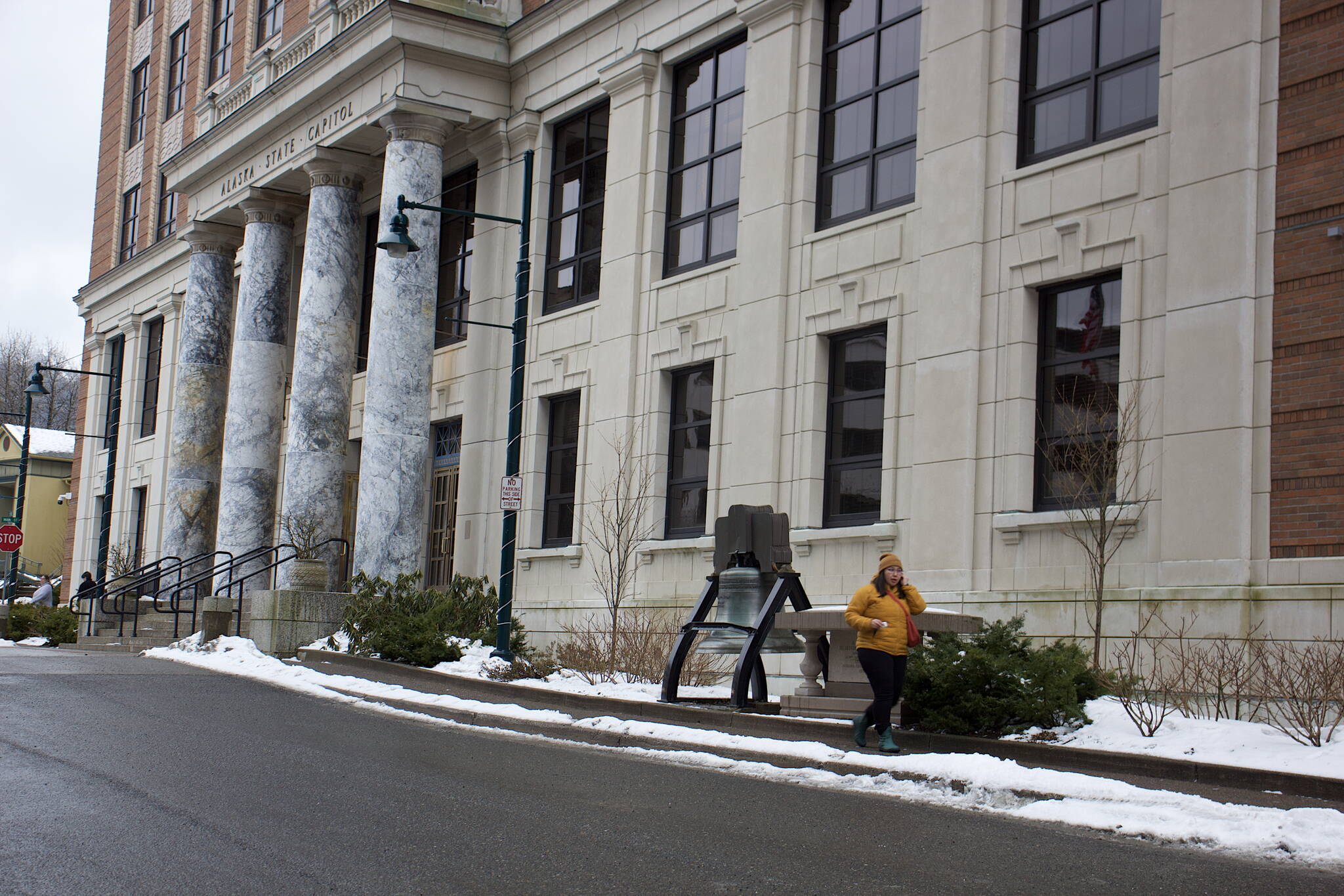 Mark Sabbatini / Juneau Empire
An employee leaves the Alaska State Capitol on Wednesday, where the 60 members of the Alaska State Legislature are slated to get a 67% pay increase to $84,000 annually following the unanimous vote by the five new members of the Alaska State Officers Compensation Commission, who were appointed during the past week to replace commission members whose majority voted to rejected the raises.