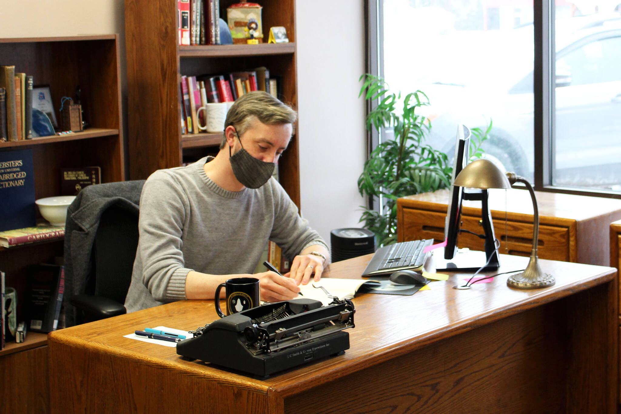 Kenai Peninsula Education Association President Nathan Erfurth works in his office on Thursday, Oct. 28, 2021, in Soldotna, Alaska. (Ashlyn O’Hara/Peninsula Clarion)