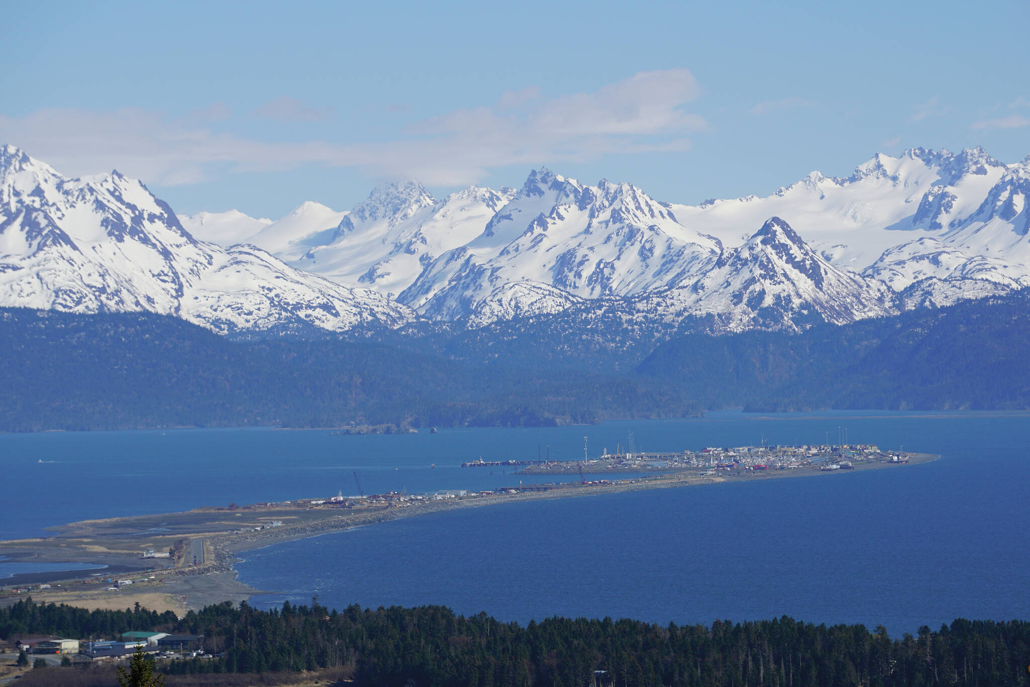 The Homer Spit and the Kenai Mountains are photographed of Monday, May 17, 2021, as seen from West Hill in Homer, Alaska. (Photo by Michael Armstrong/Homer News)