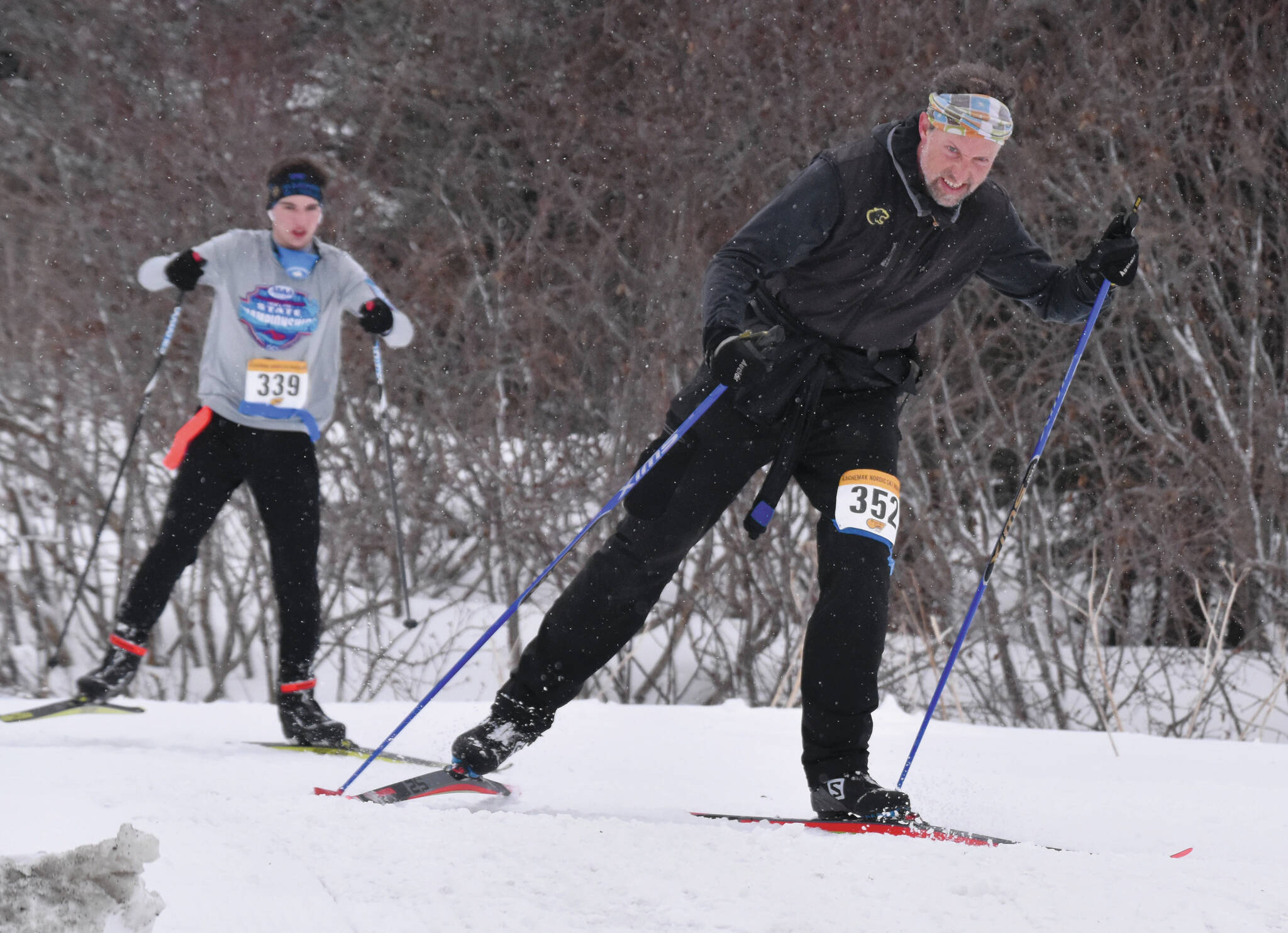 Homer’s Scott Hauser leads Homer’s Leif Jaworski up a hill in the 25-kilometer men’s race at the Kachemak Nordic Ski Marathon outside of Homer, Alaska, on Saturday, March 18, 2023. (Photo by Erin Thompson/Peninsula Clarion)