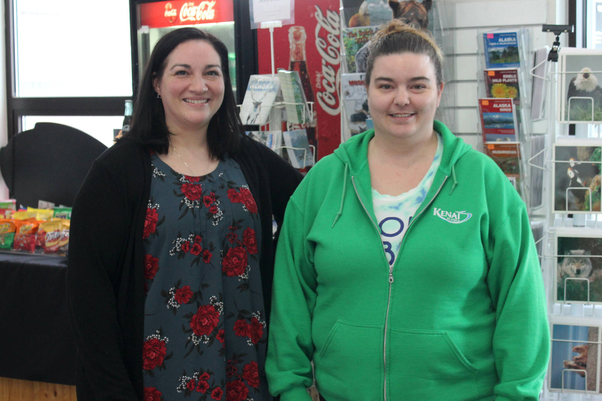 Samantha Springer, left, and Michelle Walker stand in the lobby of the Kenai Chamber of Commerce and Visitor Center on Wednesday, March 22, 2023, in Kenai, Alaska. (Ashlyn O’Hara/Peninsula Clarion)