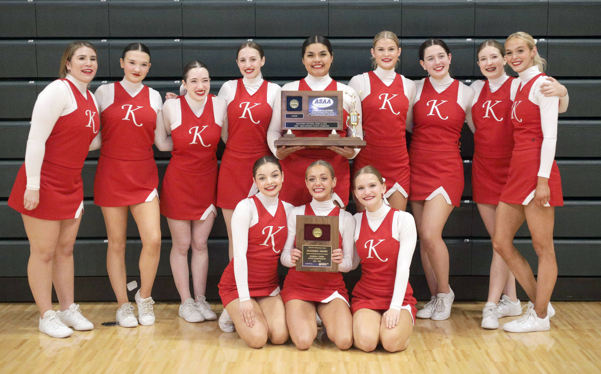 The Kenai Central cheerleading team. Back row, left to right: Caitlyn Martin, Sylvia McGraw, Ayla Tallent, Sarah Baisden, Genesis Trevino, Malena Grieme, Maya Montague, Taya Swick and Cali Holmes. Front row, left to right: Ella Romero, Brooklynn Reed and Makenize Harden. (Photo provided)