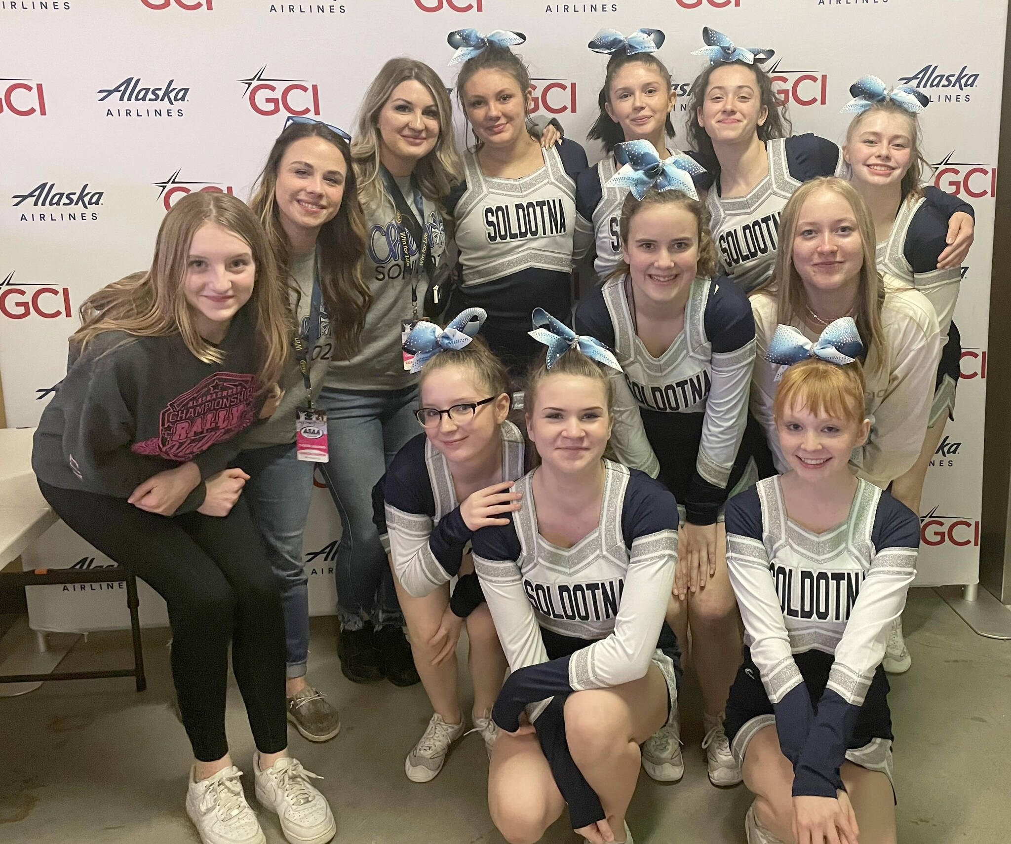 The Soldotna cheerleading squad. Top row, left to right: Olivia Hays, head coach Jayda Williams, assistant coach Lacie Kelly, Rylen Weed, Elizabeth Garcia, Adele Tacey and Savannah Hawkins. Middle row, left to right: Angelina Beck, Lacy Nye and Mazzy Bundy. Bottom row, left to right: Lynzie Denbow and Hailey Stonecipher.