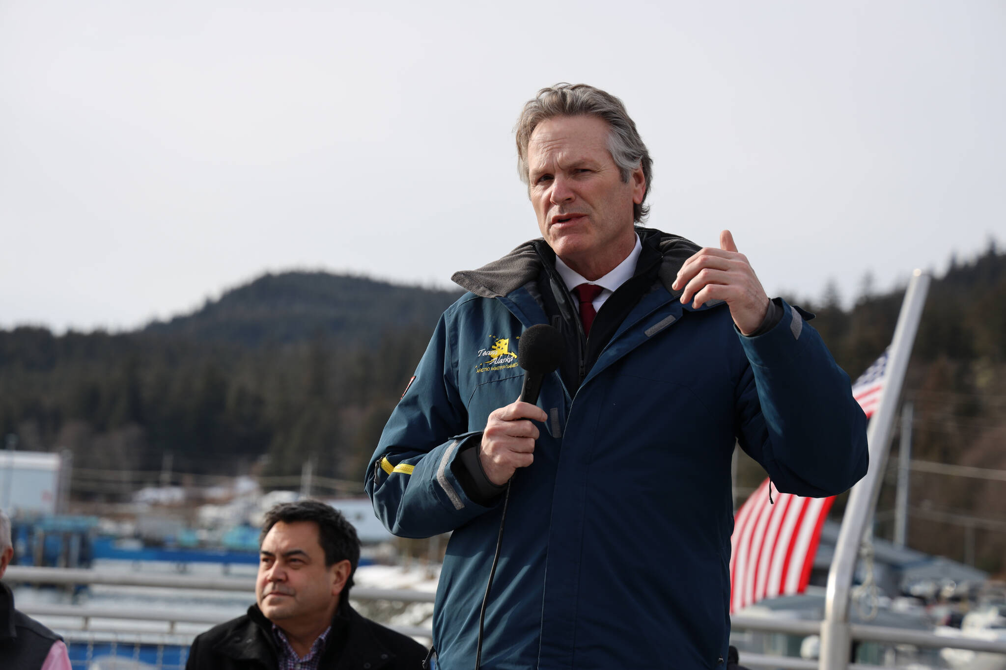 Gov. Mike Dunleavy speaks in support of an agreement between the Alaska Department of Transportation and Public Facilities and Goldbelt Inc. to pursue engineering and design services to determine whether it’s feasible to build a new ferry terminal facility in Juneau at Cascade Point. (Clarise Larson / Juneau Empire File)