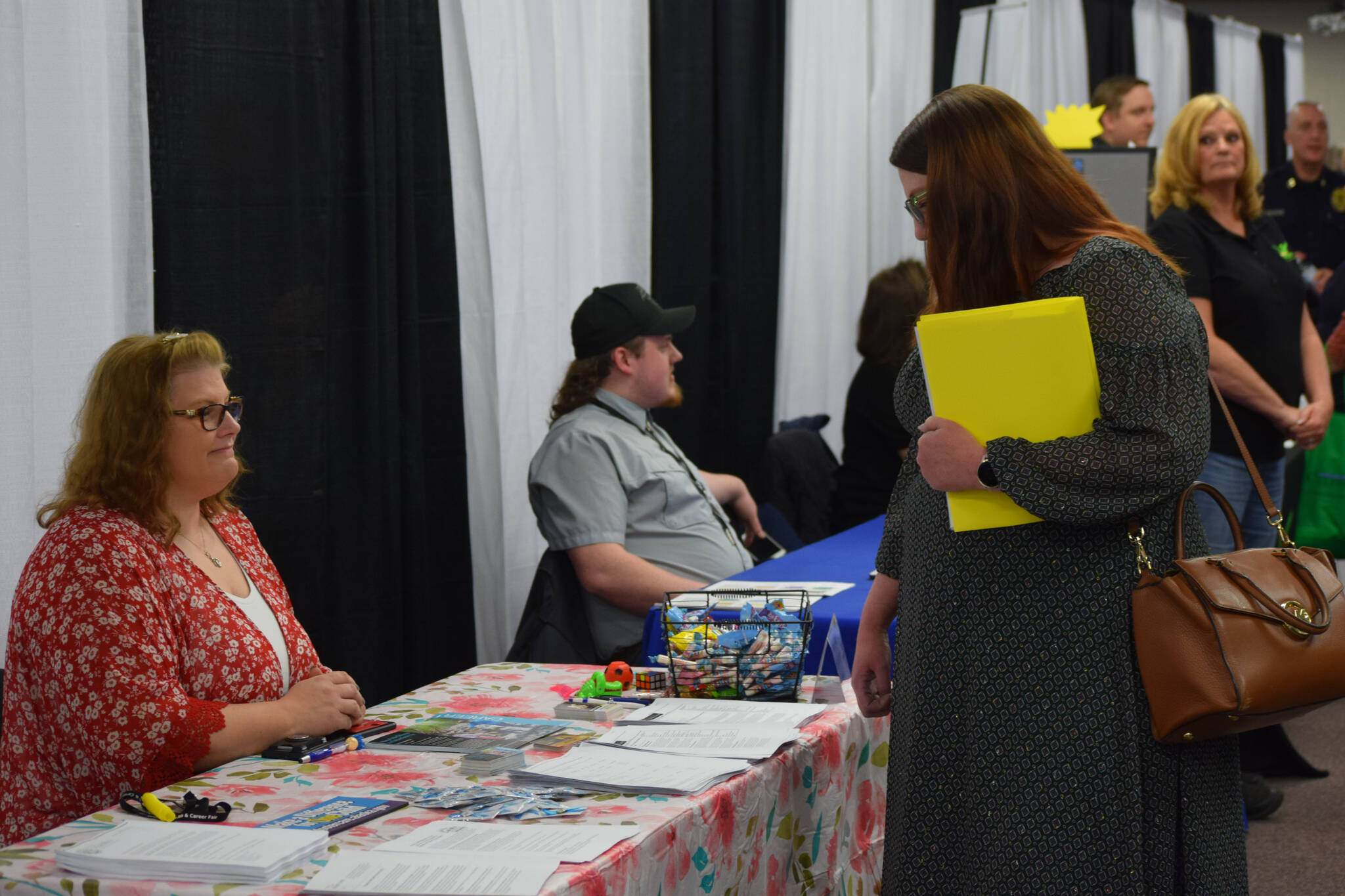 Community members participate in the Kenai Peninsula Job and Career Fair at the Soldotna Regional Sports Complex on Thursday, April 7, 2022. (Camille Botello/Peninsula Clarion)