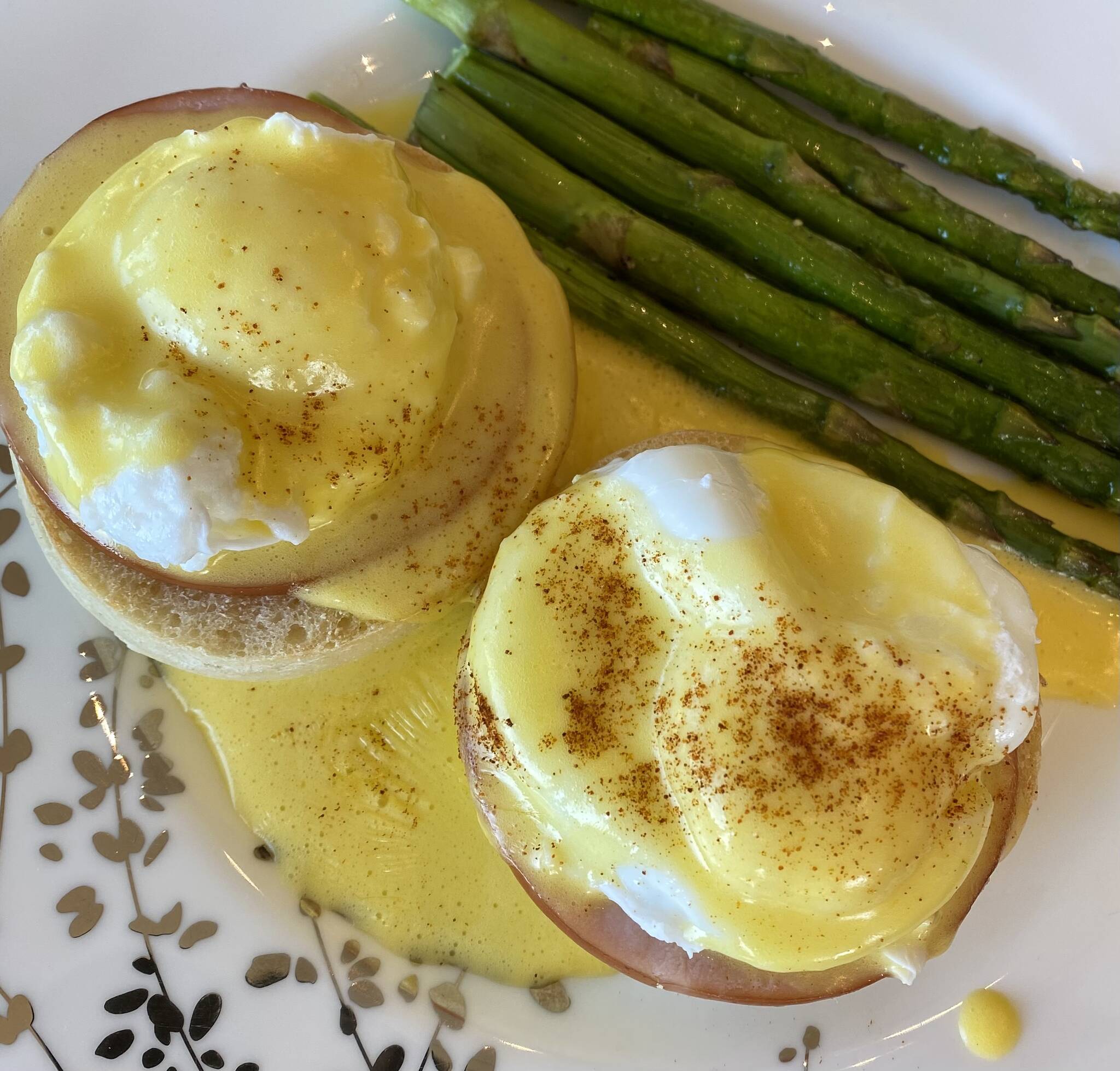 Hollandaise sauce is served on poached eggs. (Tressa Dale / Peninsula Clarion)
