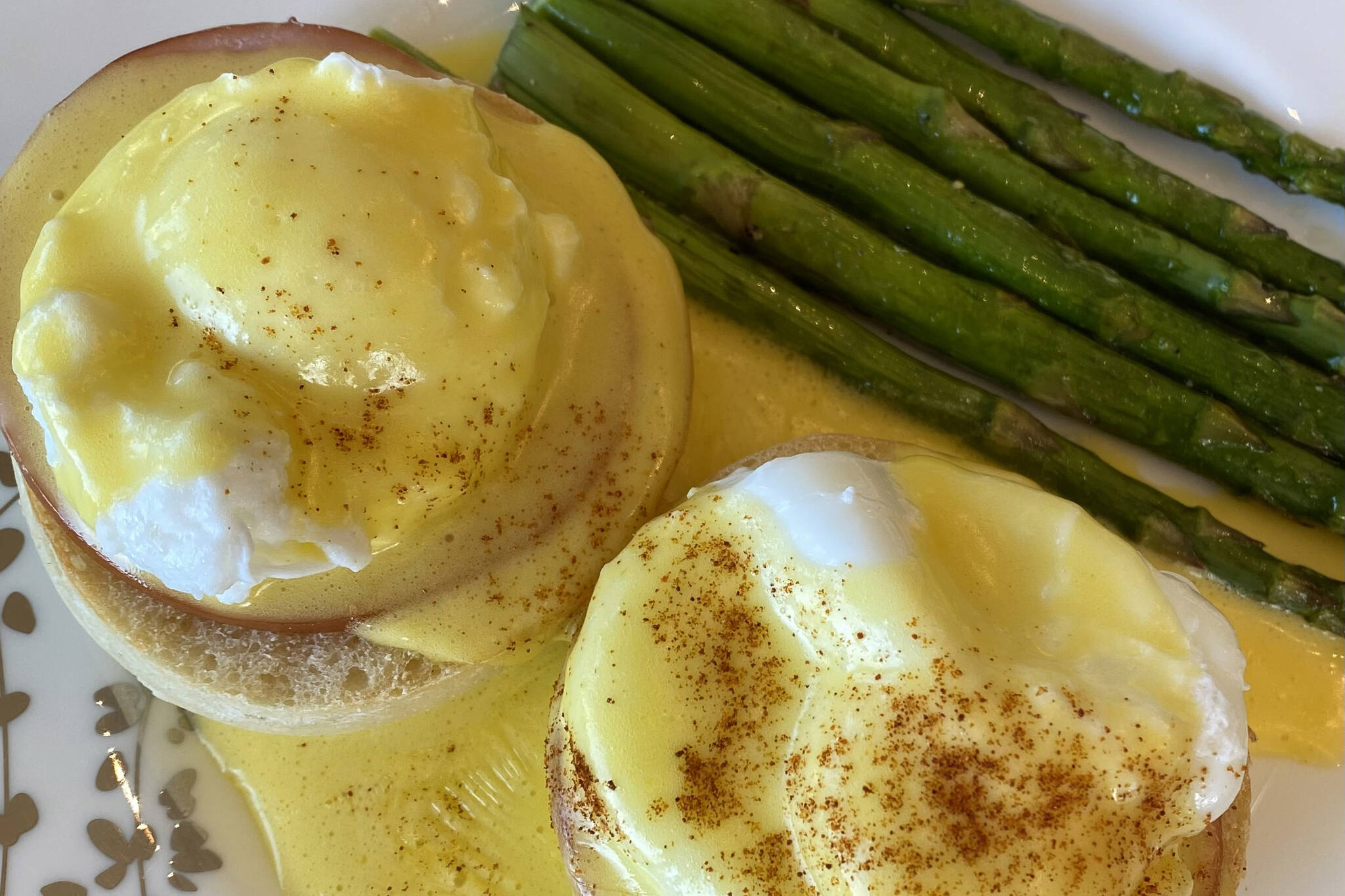 Hollandaise sauce is served on poached eggs. (Tressa Dale / Peninsula Clarion)