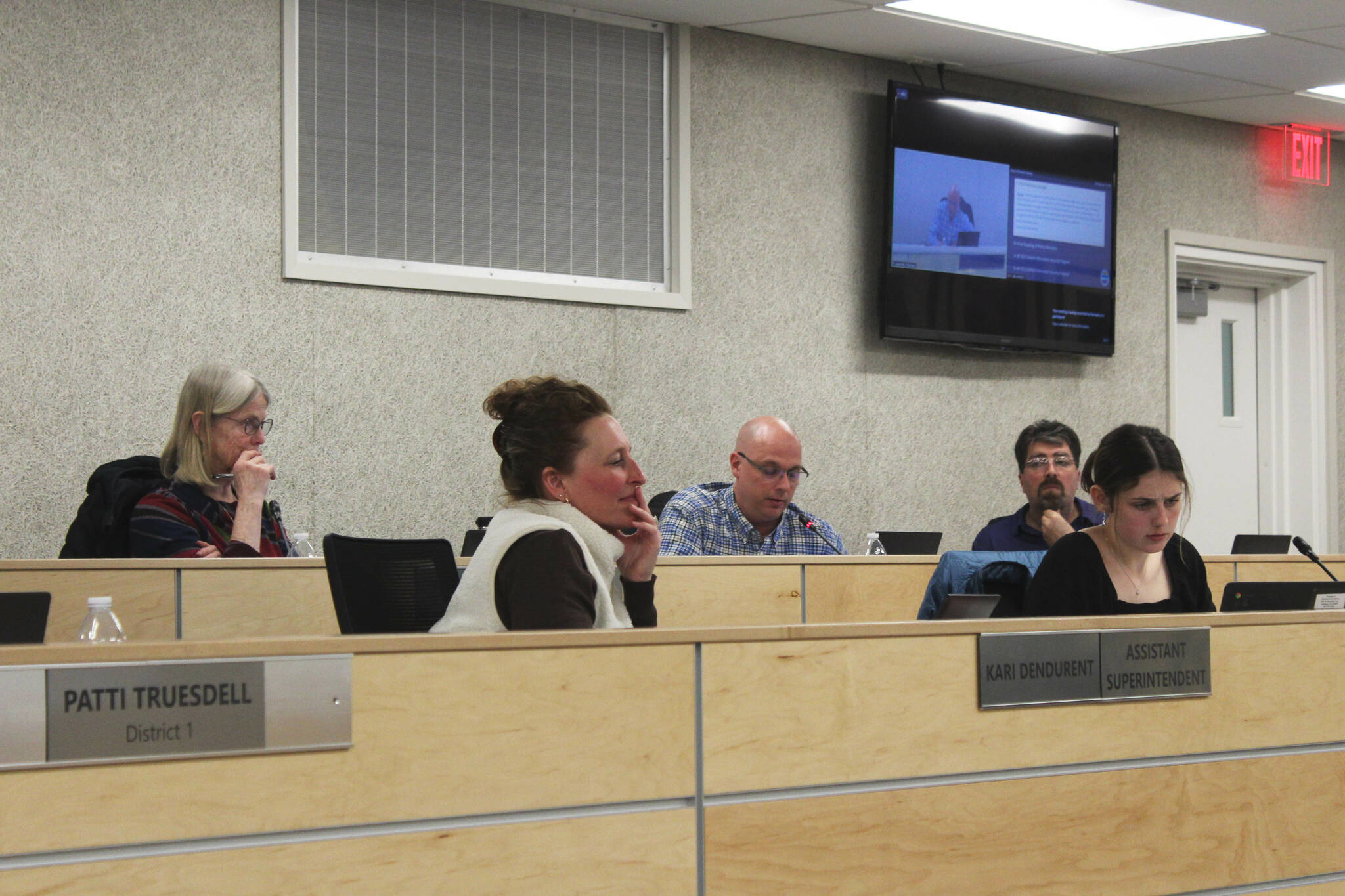 From left: Kenai Peninsula Borough School District Board of Education member Penny Vadla; Assistant Superintendent Kari Dendurent; Board members Jason Tauriainen and Matt Morse; and student representative Ashley Dahlman participate in a board meeting on Monday, April 11, 2023 in Soldotna, Alaska. (Ashlyn O’Hara/Peninsula Clarion)