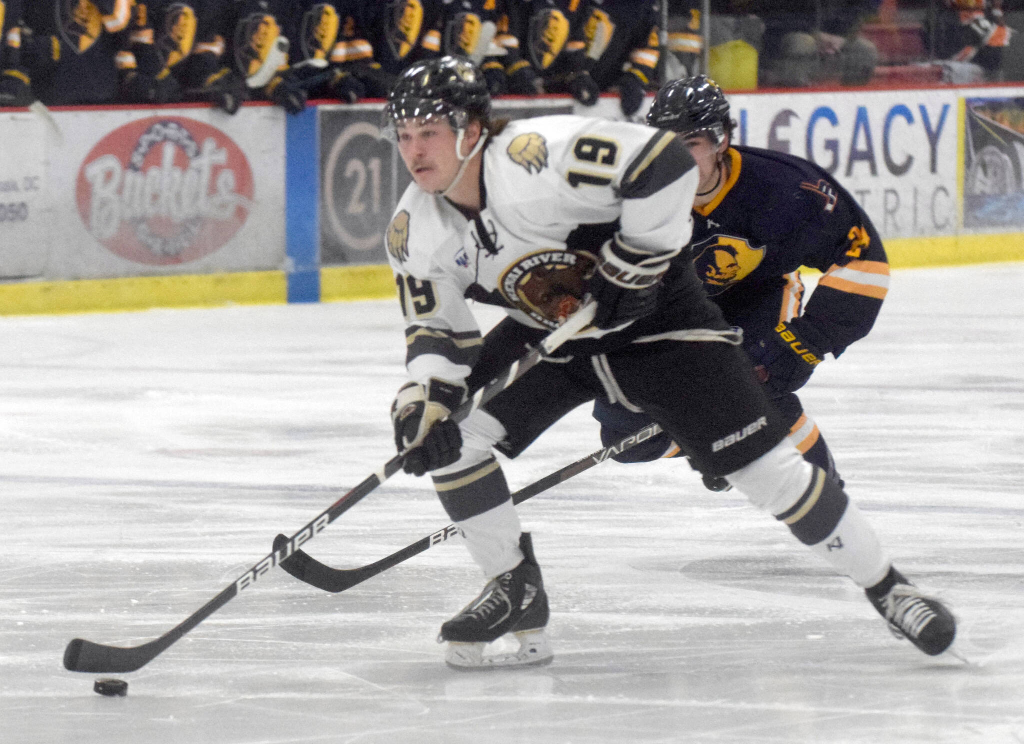 Kenai River Brown Bears forward Parker Lockwood attacks against the Springfield (Illinois) Jr. Blues on Friday, Nov. 19, 2021, at the Soldotna Regional Sports Complex in Soldotna, Alaska. (Photo by Jeff Helminiak/Peninsula Clarion)