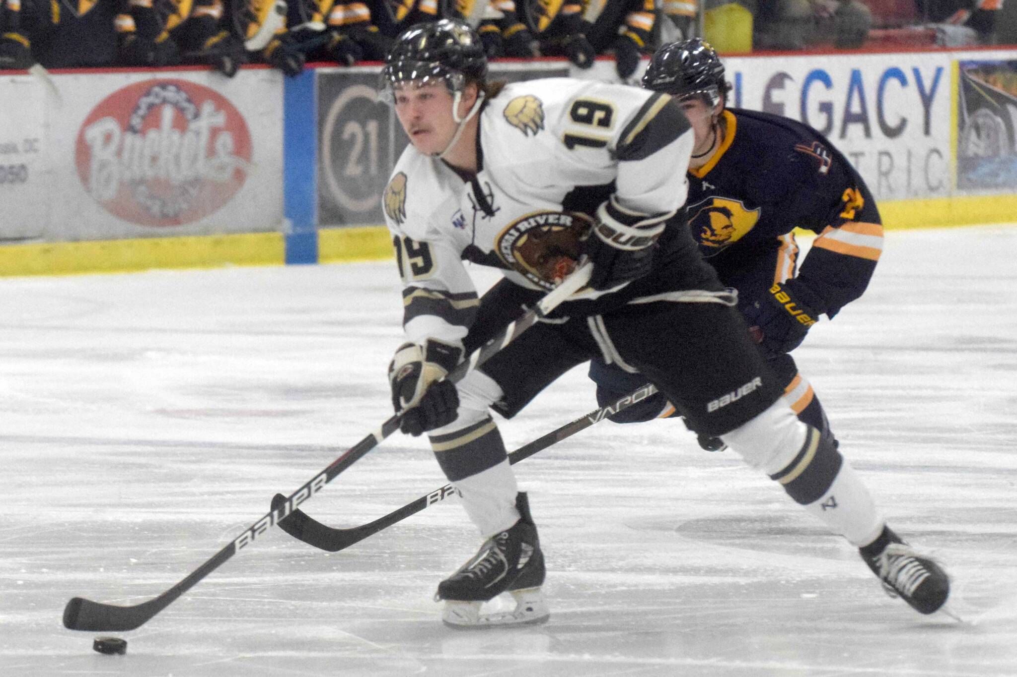 Kenai River Brown Bears forward Parker Lockwood attacks against the Springfield (Illinois) Jr. Blues on Friday, Nov. 19, 2021, at the Soldotna Regional Sports Complex in Soldotna, Alaska. (Photo by Jeff Helminiak/Peninsula Clarion)