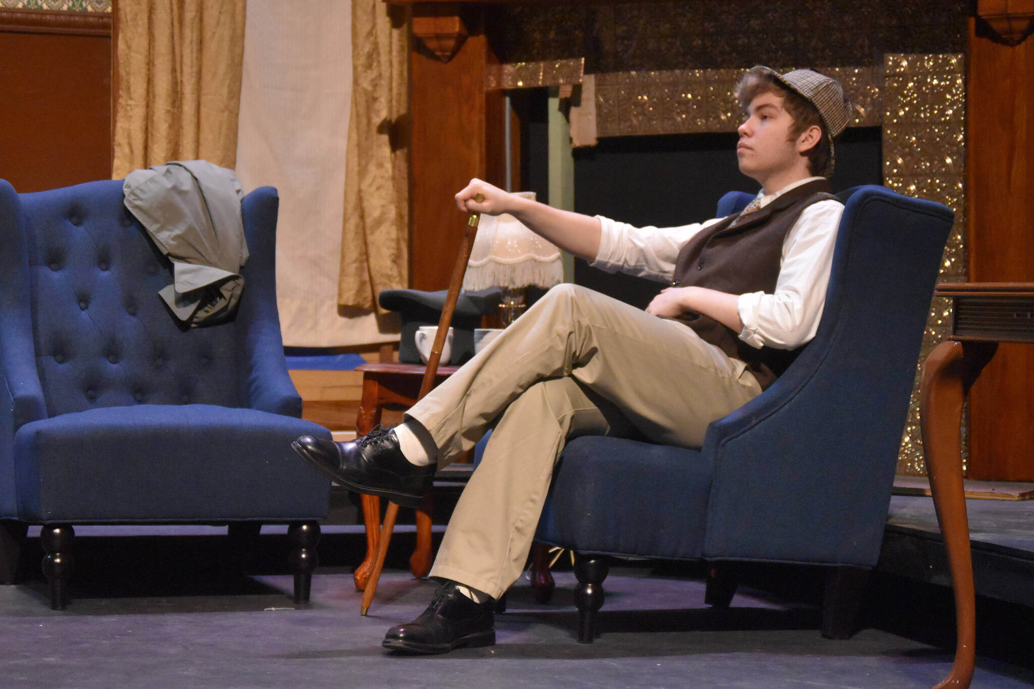 Josiah Burton portrays Sherlock Holmes during a rehearsal of “Sherlock Holmes: The Final Adventure” at Soldotna High School in Soldotna, Alaska, on Wednesday, April 12, 2023. (Jake Dye/Peninsula Clarion)