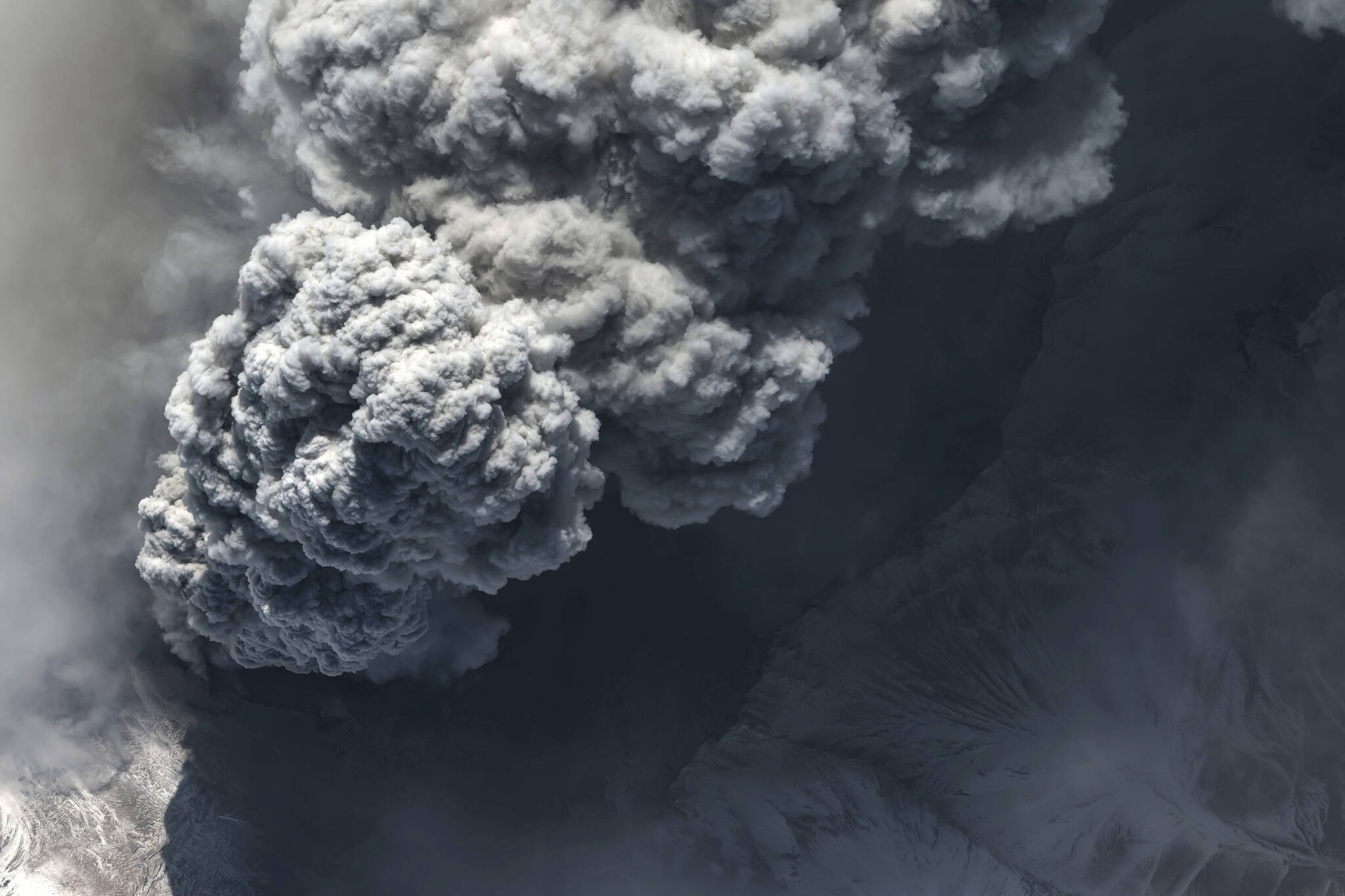 This satellite image provided by Maxar Technologies shows a crater and an ash cloud after the Shiveluch volcano erupted in Klyuchi village on the Kamchatka Peninsula in Russia, Wednesday, April 12, 2023. Shiveluch, one of Kamchatka Peninsula’s most active volcanoes, started erupting early Tuesday, spewing ash more than 300 miles northwest. Several Russian villages were covered in grey volcanic dust in the largest fallout in nearly 60 years. (Satellite image ©2023 Maxar Technologies via AP)