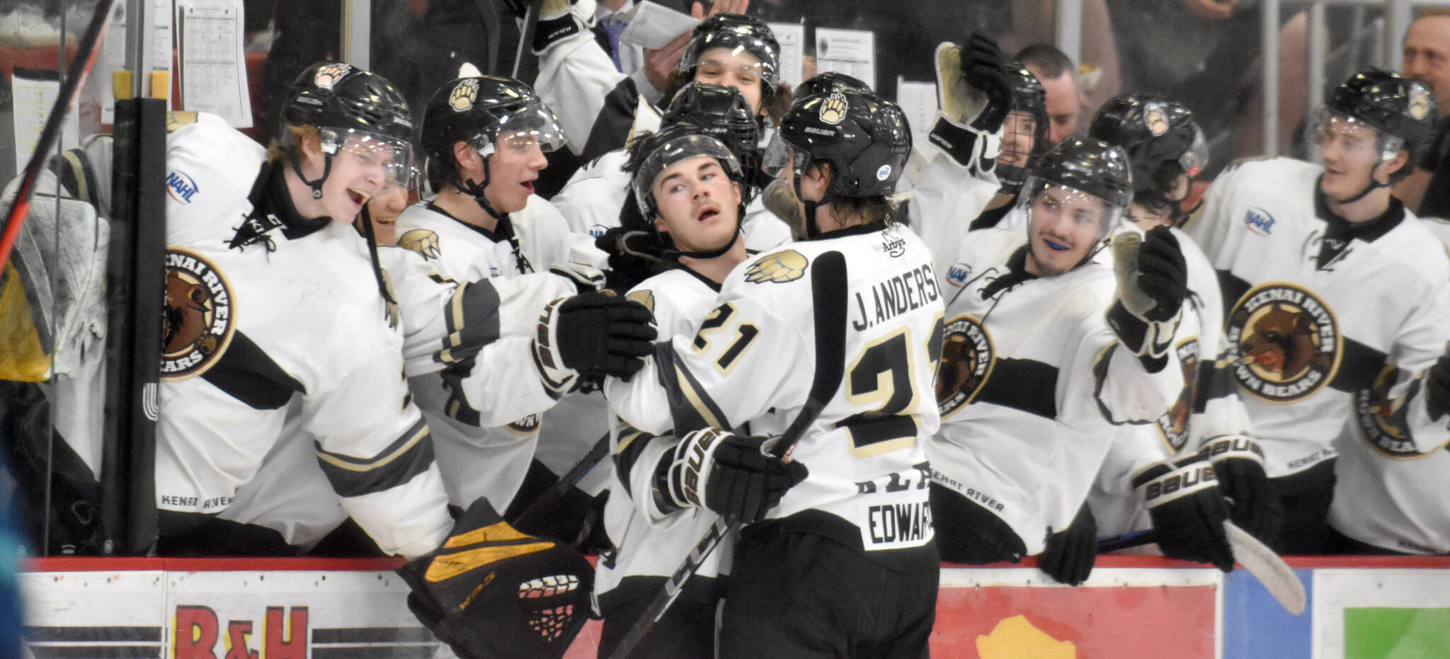 The Kenai River Brown Bears celebrate a goal by Parker Lockwood on Saturday, April 15, 2023, at the Soldotna Regional Sports Complex. (Photo by Jeff Helminiak/Peninsula Clarion)