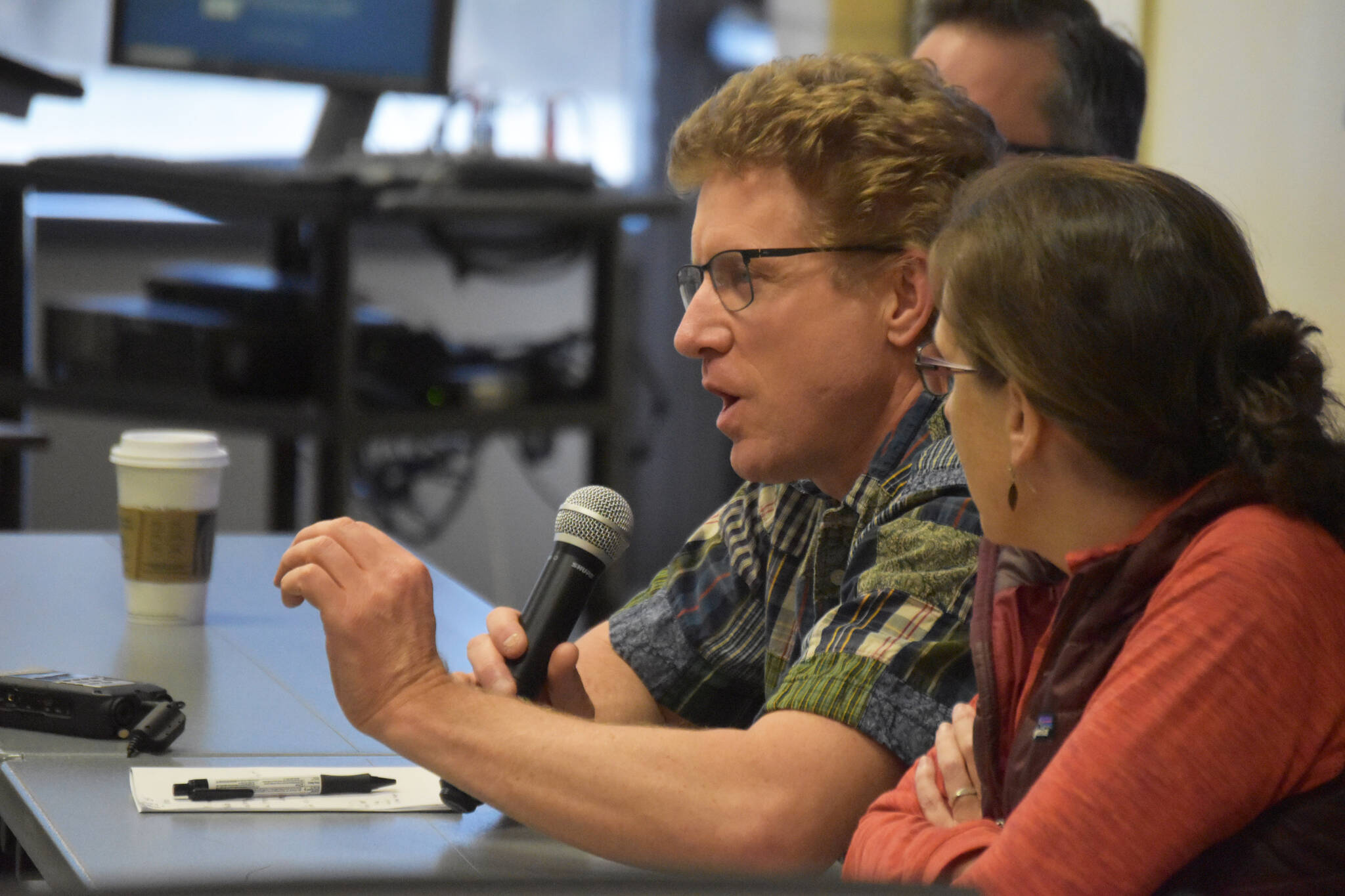 Department of Fish and Game Biologist Adam Reimer responds to a question during a panel discussion for the Kenai Peninsula College Showcase “State of the Salmon” on Wednesday, April 20, 2023, at KPC in Soldotna, Alaska. (Jake Dye/Peninsula Clarion)