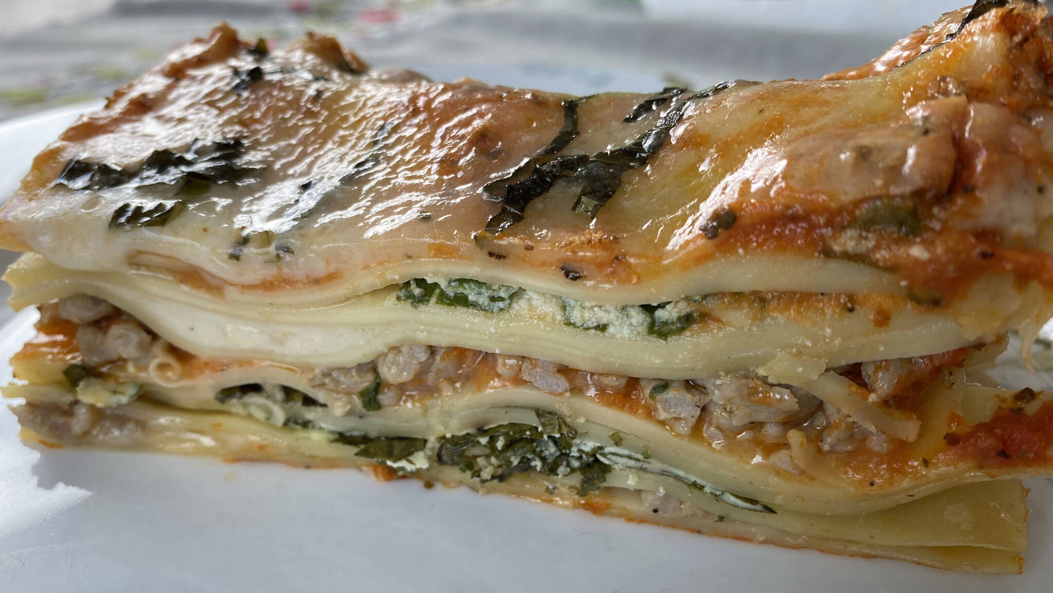 This meat lasagna includes layers of sausage, ricotta, bechamel and spinach. (Photo by Tressa Dale/Peninsula Clarion)