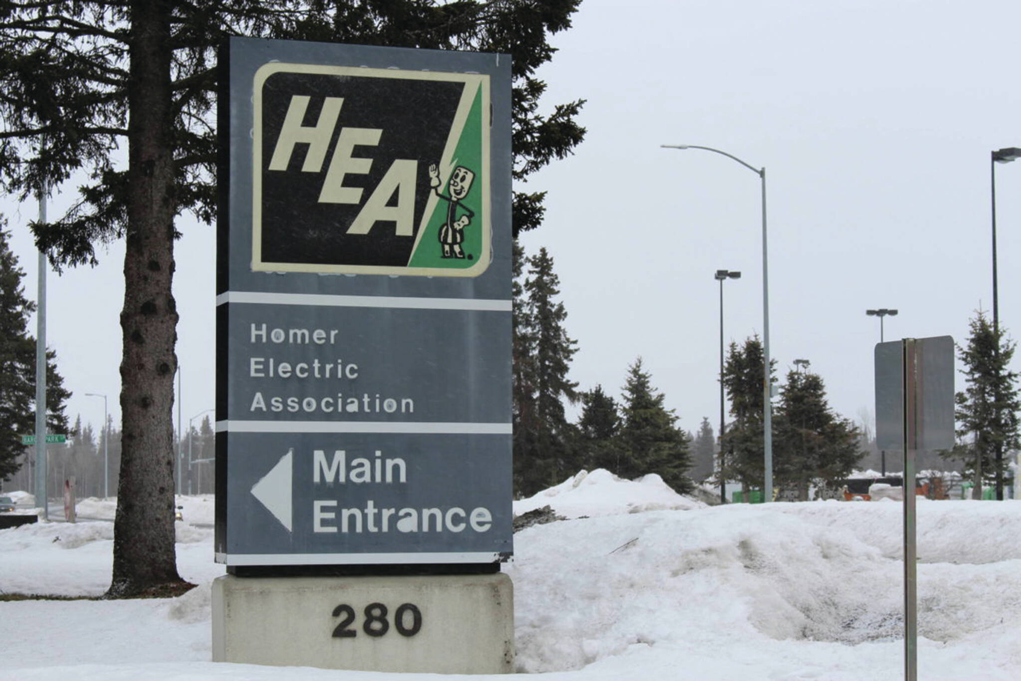 The sign in front of the Homer Electric Association building in Kenai, Alaska, as seen on April 1, 2020. (Photo by Brian Mazurek/Peninsula Clarion)