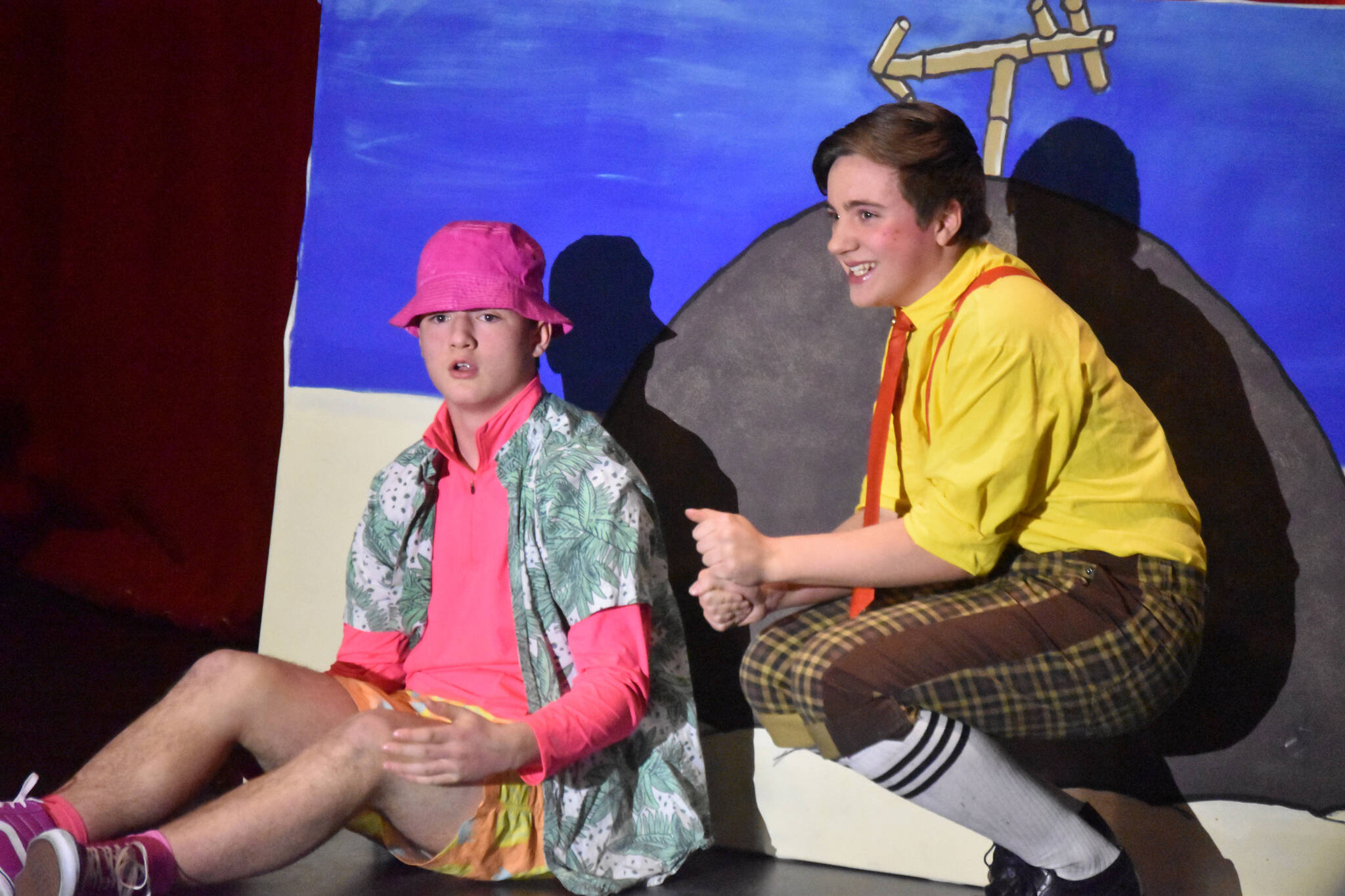 Oliver Parrish portraying Patrick Star, acts alongside Jackson Hooper as SpongeBob during a rehearsal of “SpongeBob SquarePants” on Saturday, April 15, 2023, at Nikiski Middle/High School in Nikiski, Alaska. (Jake Dye/Peninsula Clarion)