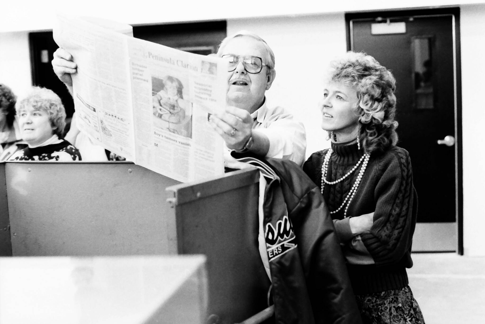 Former Clarion owner Wayne Dunworth examines one of the first issues of the Clarion printed on the Goss Suburban at an opening event in December 1992, in the Peninsula Clarion pressroom in Kenai, Alaska. (Roy Shapley/Peninsula Clarion)